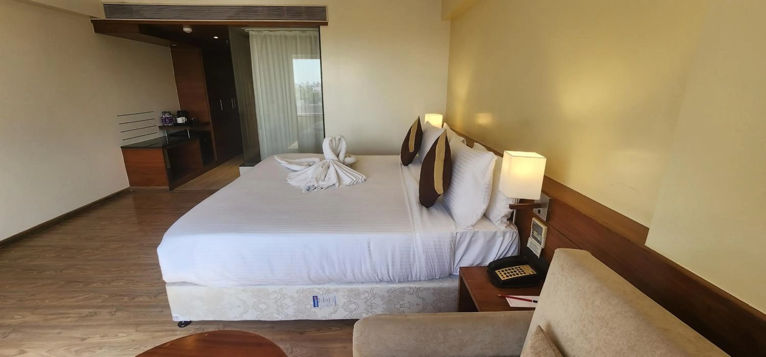 Bed in Temple Tree Hotel Shirdi, a member of Radisson Individuals