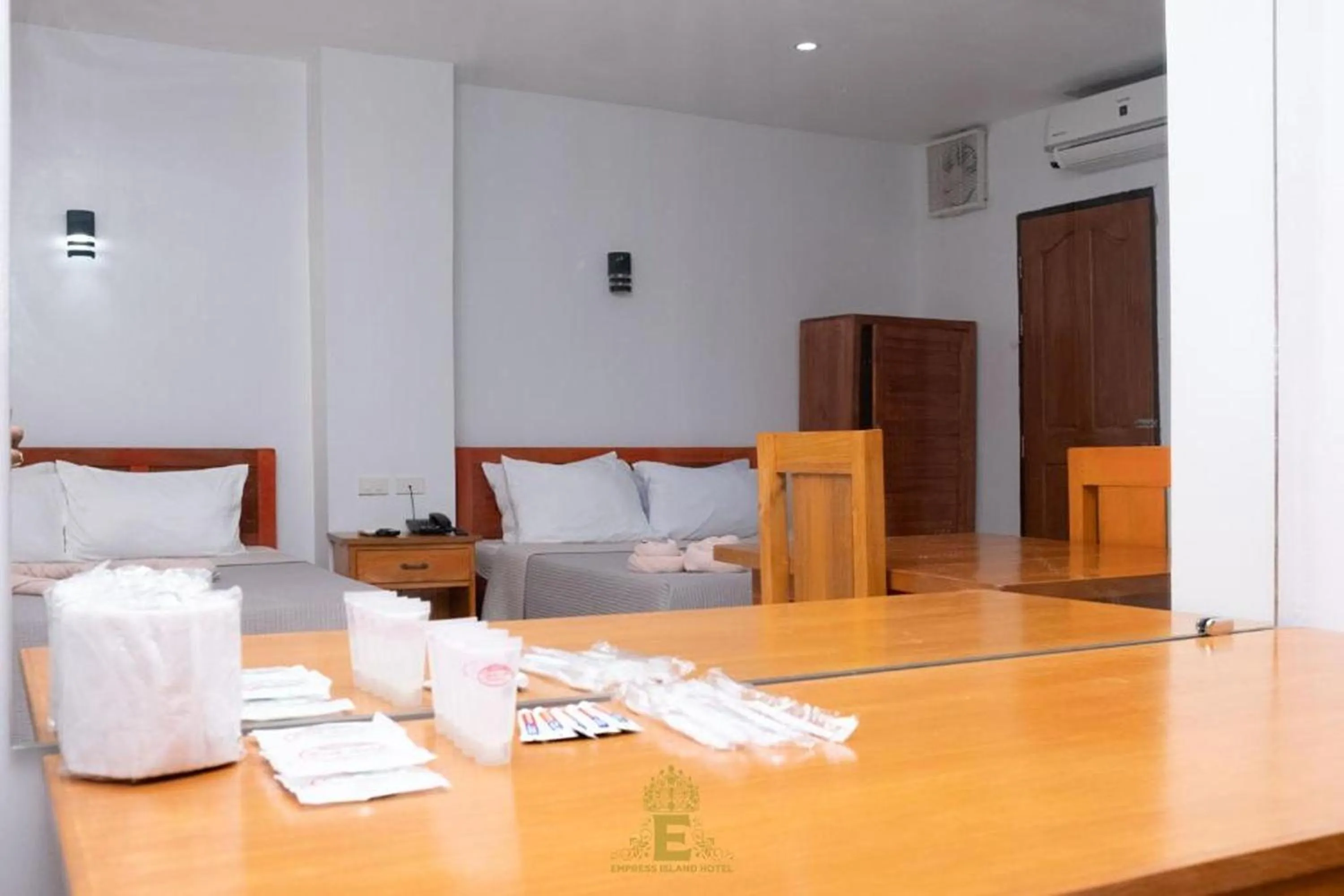 Bed in Empress Island Hotel