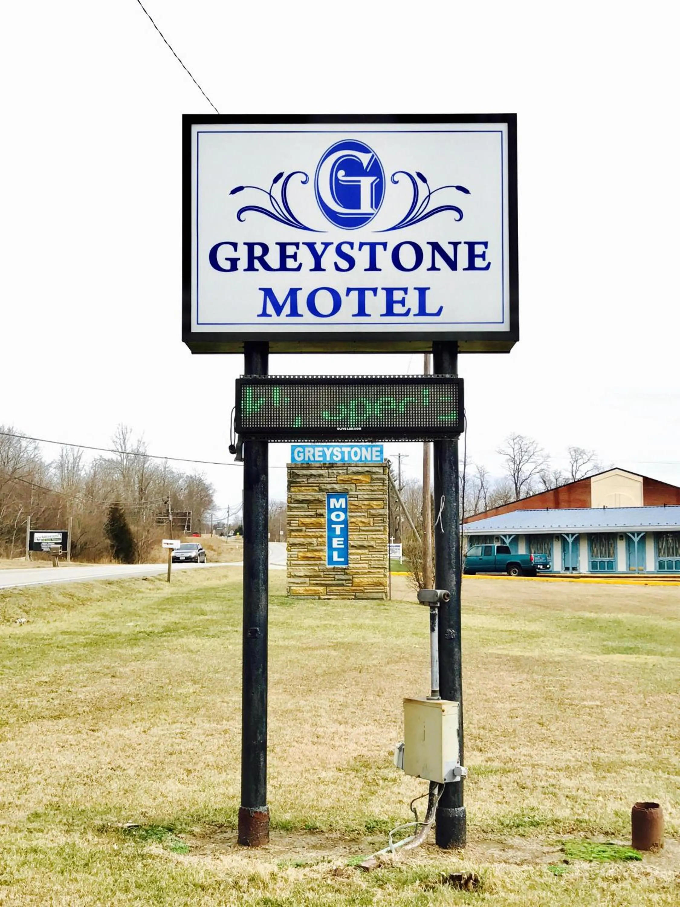 Property logo or sign in Greystone Motel