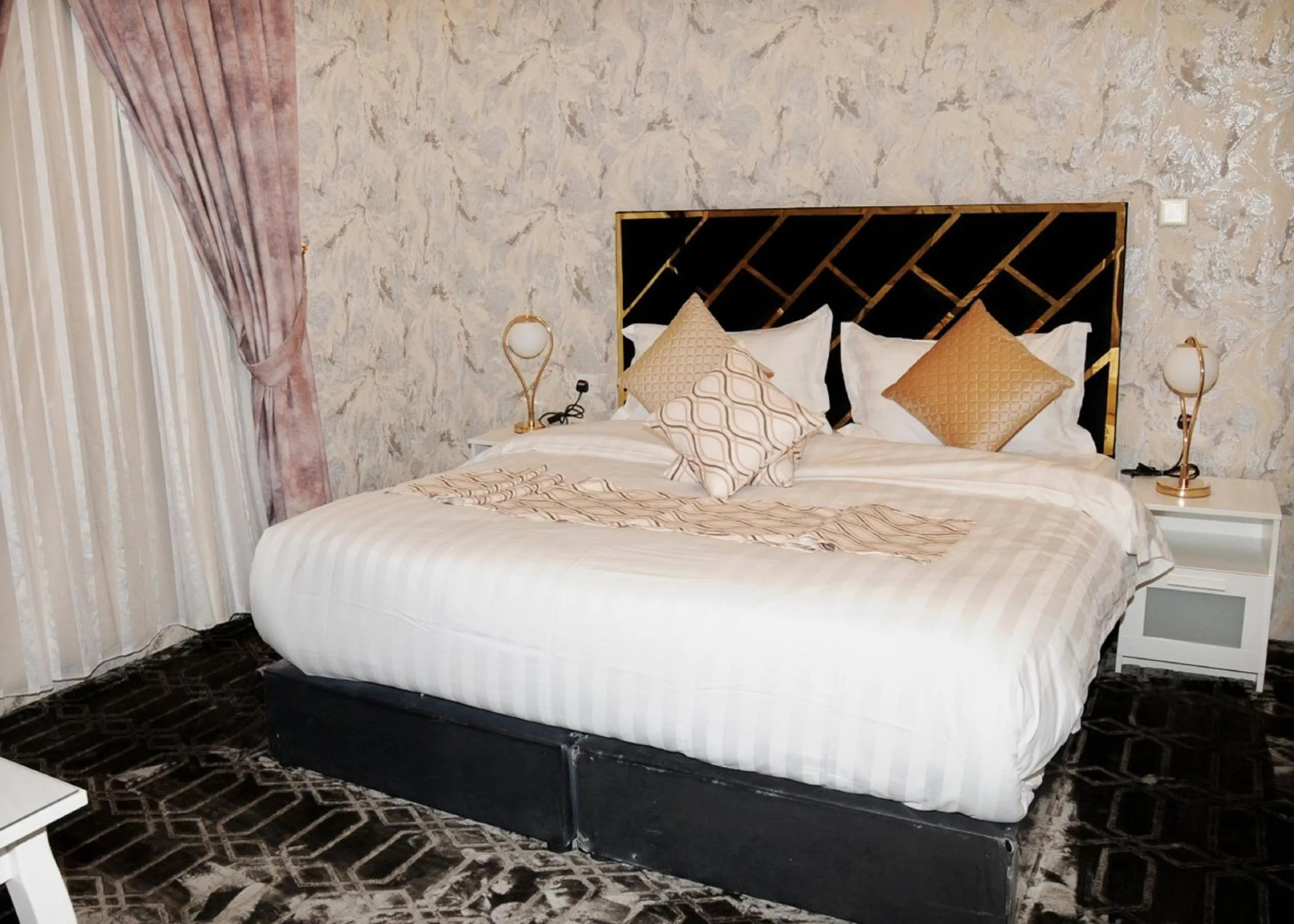 Bedroom in Al Nabarees Al Masi Hotel