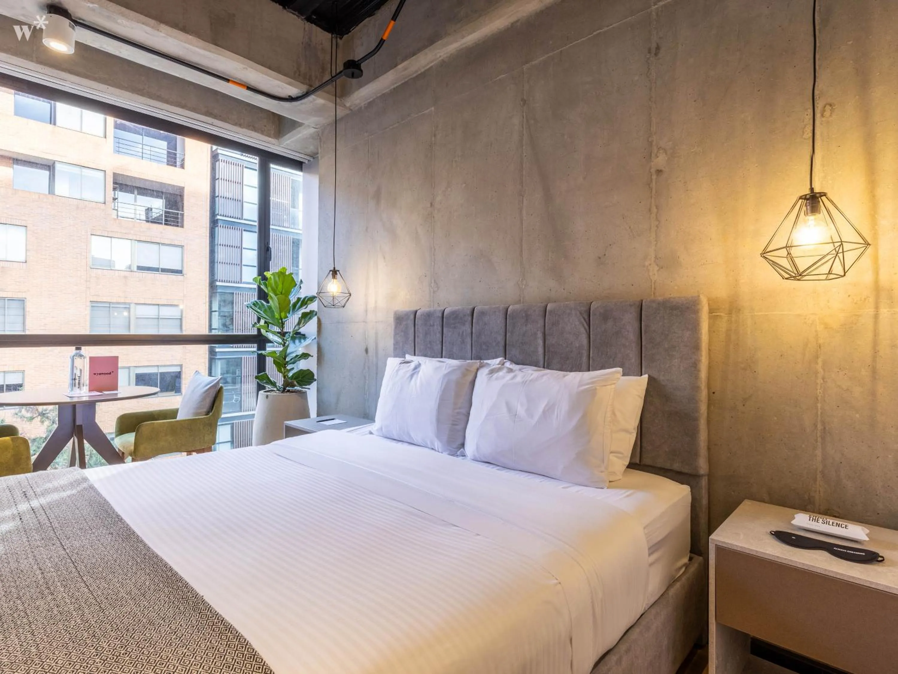 Bed in Beliving by Wynwood House