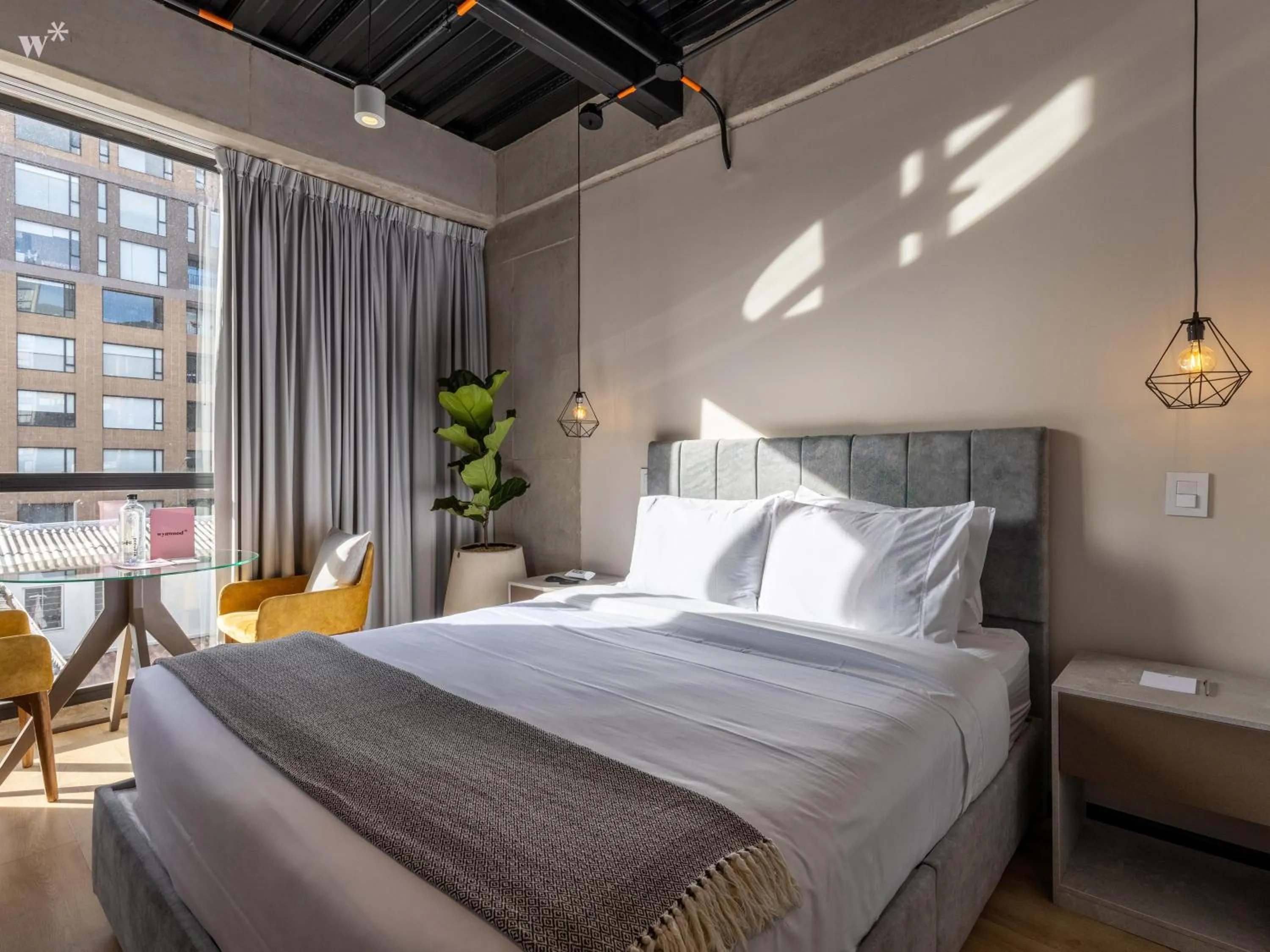 Bed in Beliving by Wynwood House