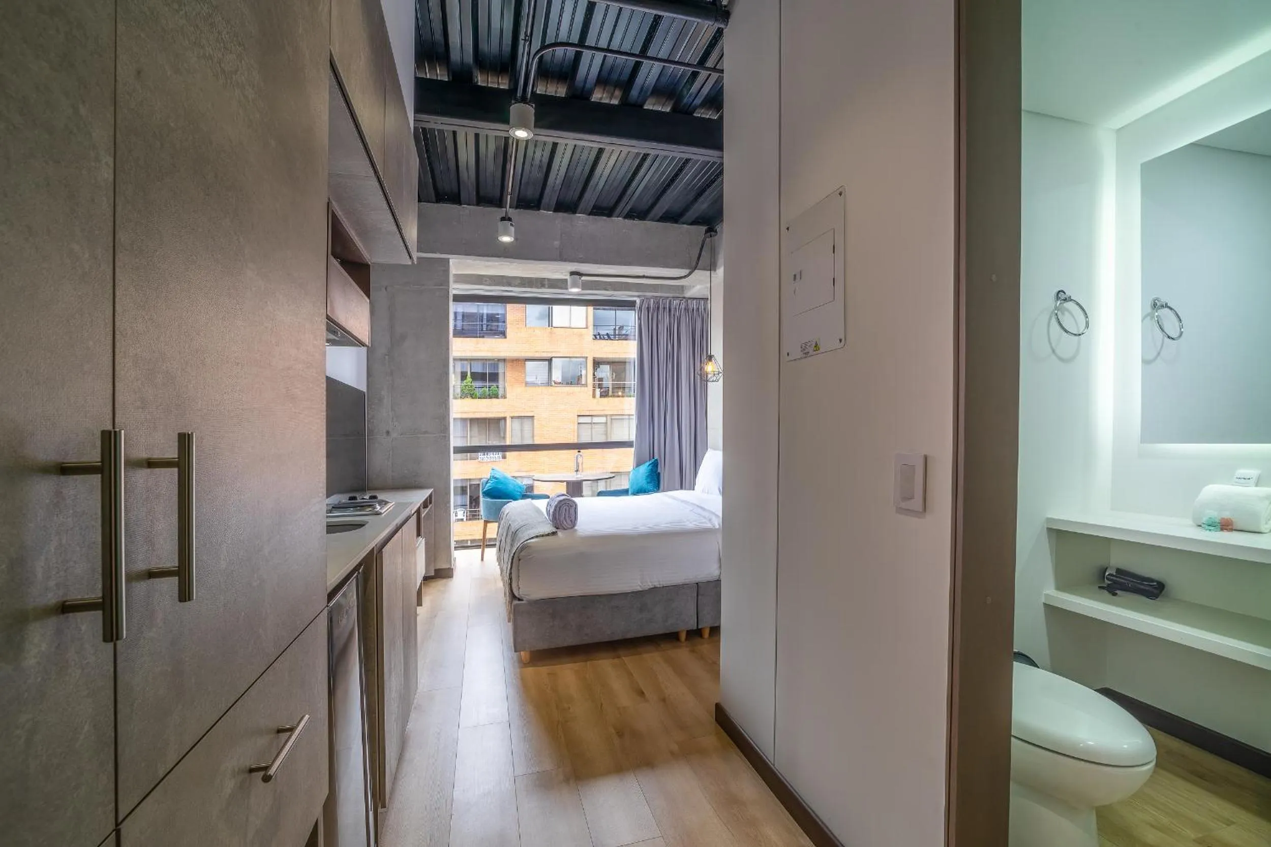 Bed in Beliving by Wynwood House