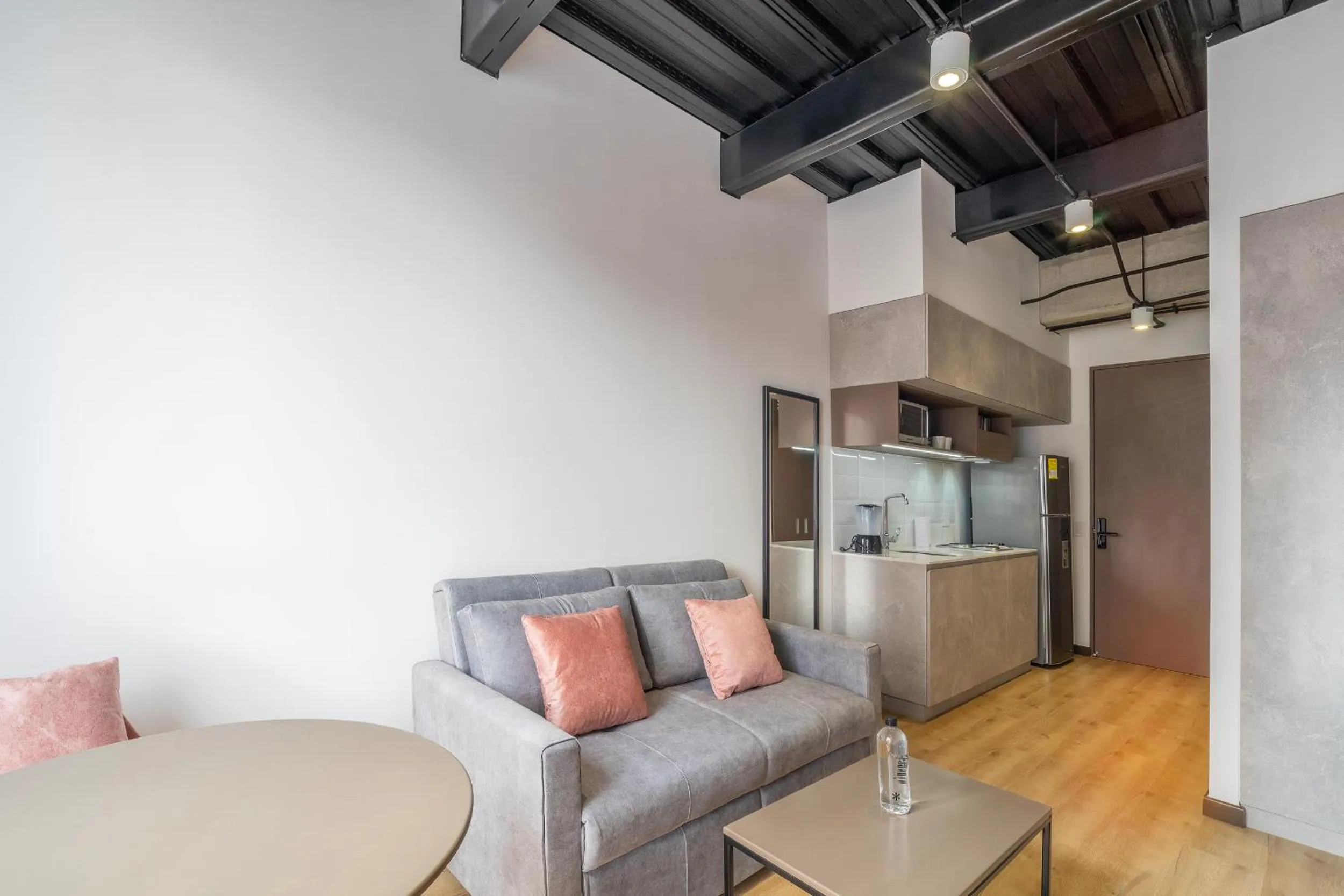 Living room in Beliving by Wynwood House