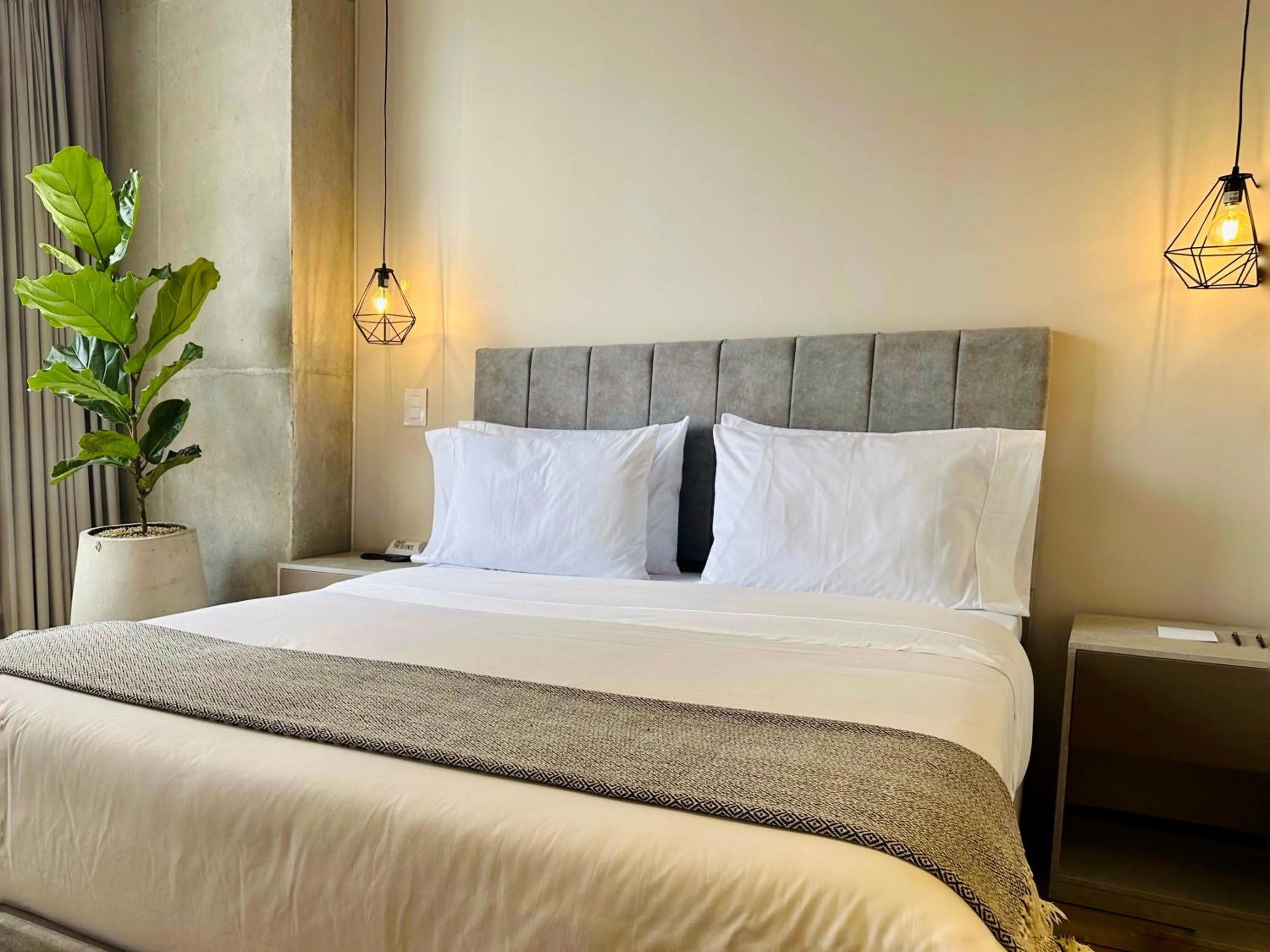 Bed in Beliving by Wynwood House