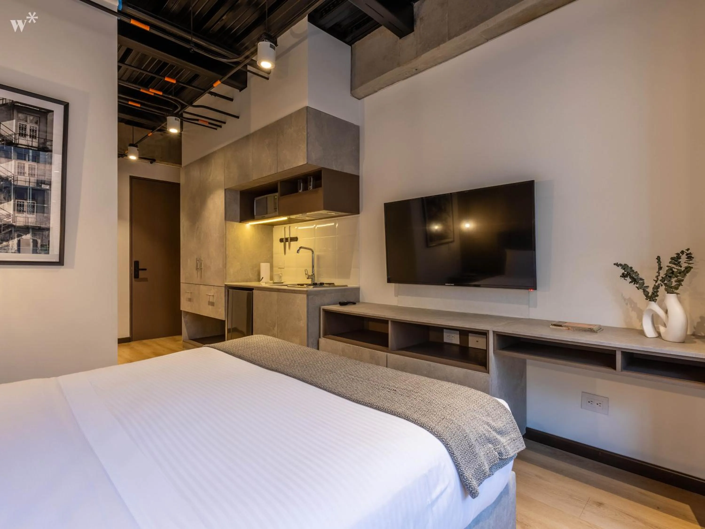 Bed in Beliving by Wynwood House