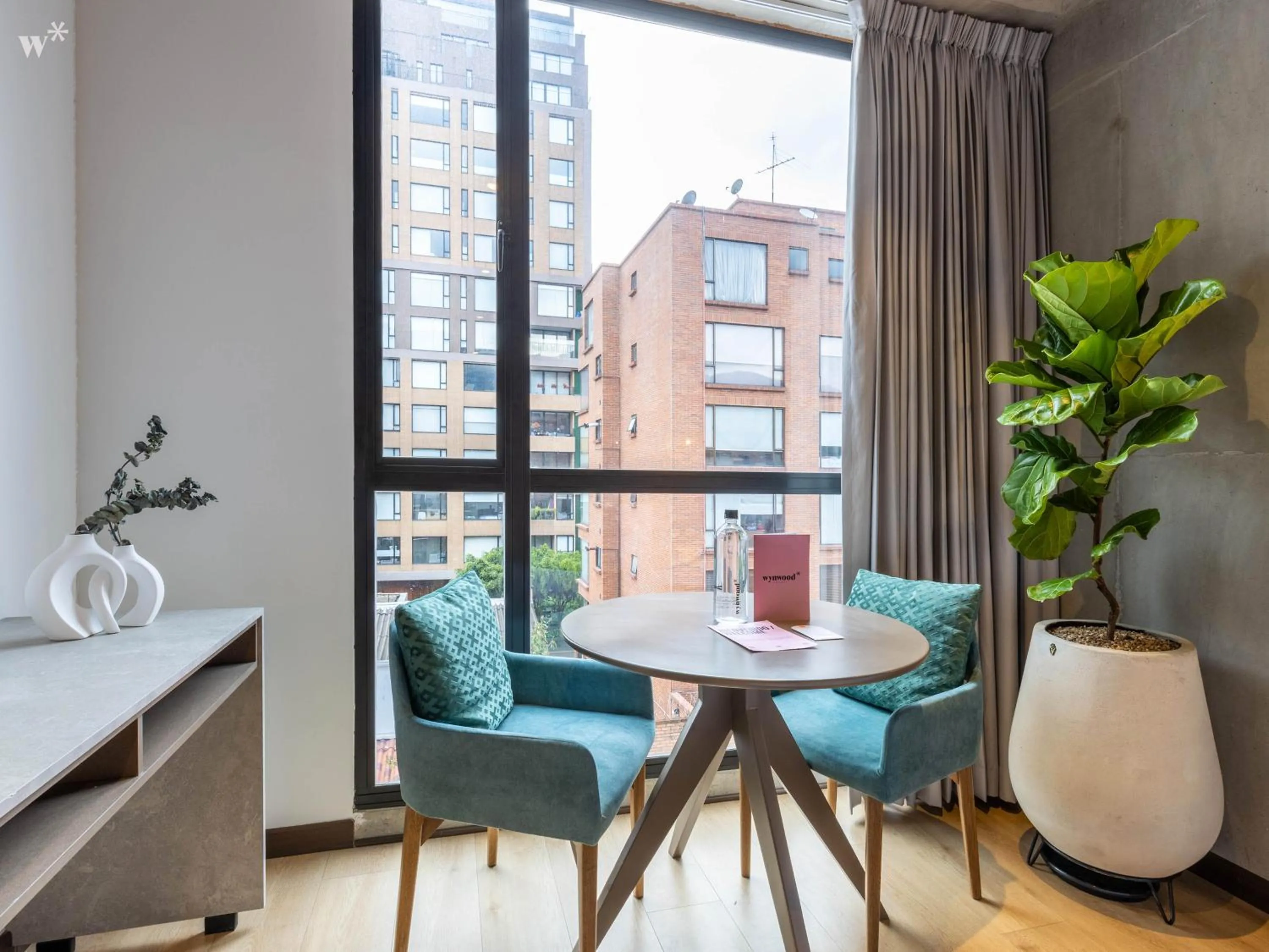 Living room in Beliving by Wynwood House