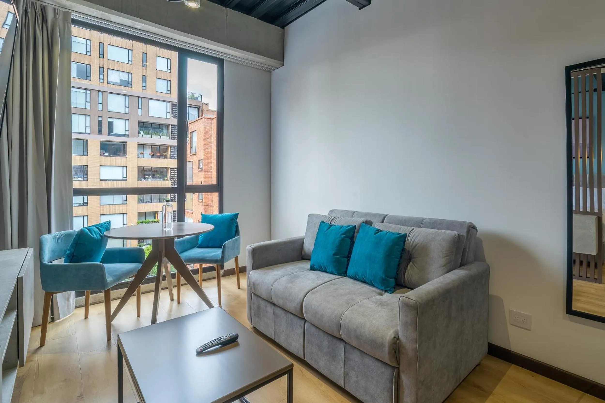 Living room in Beliving by Wynwood House