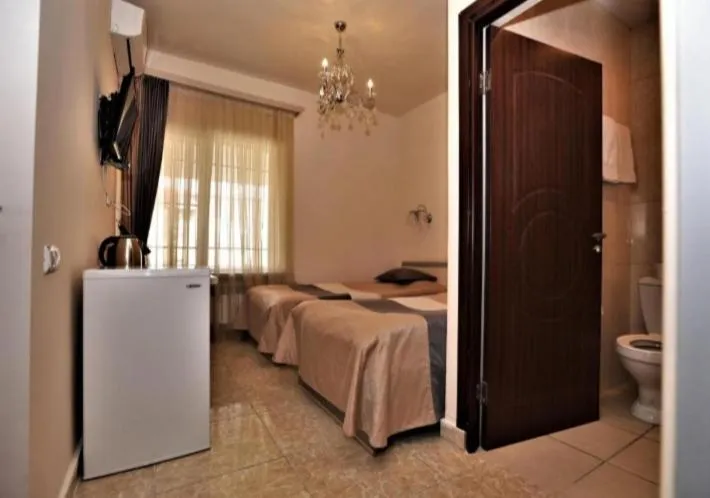 Bed in Comfort House Hotel