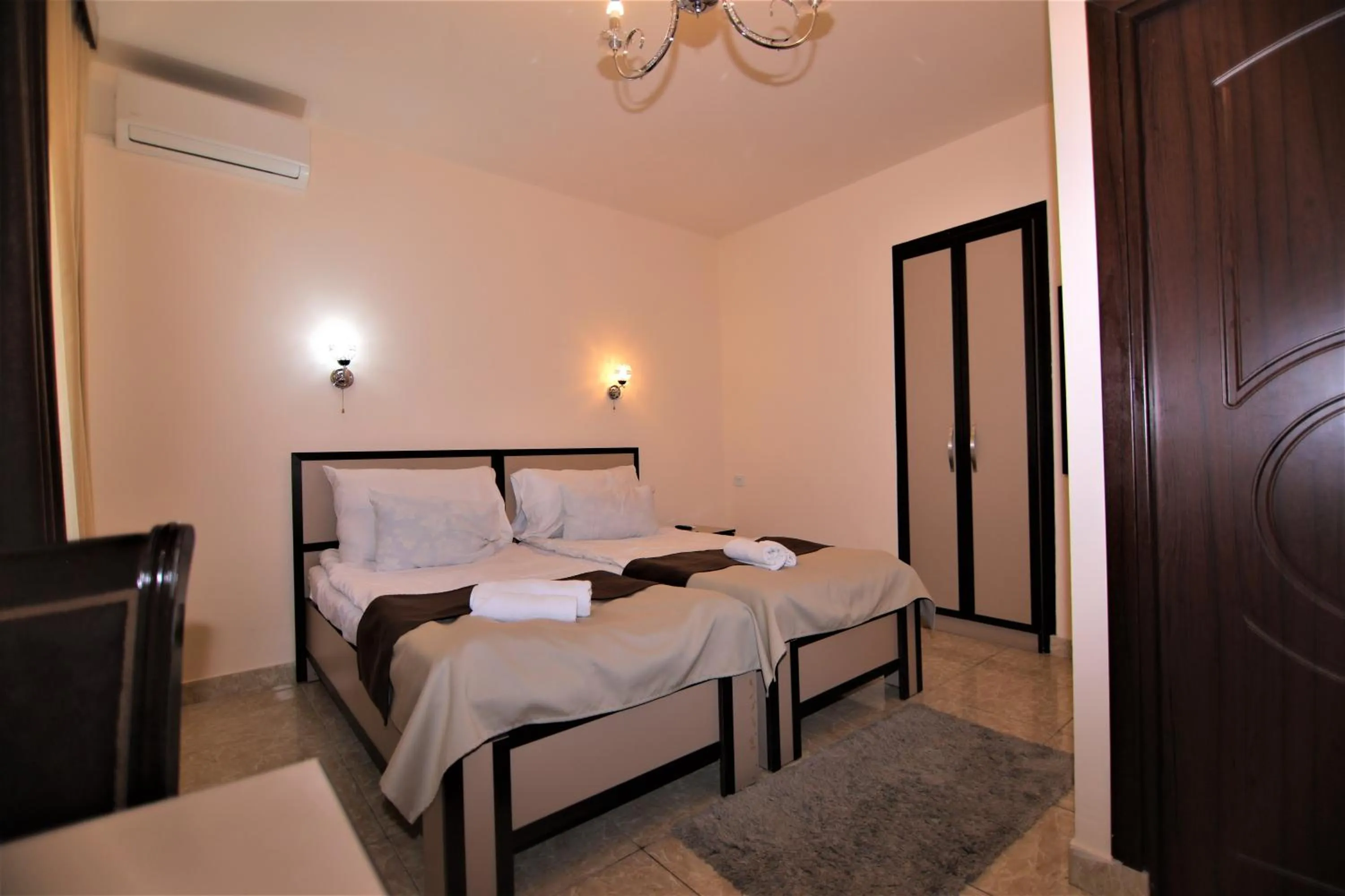 Bed in Comfort House Hotel