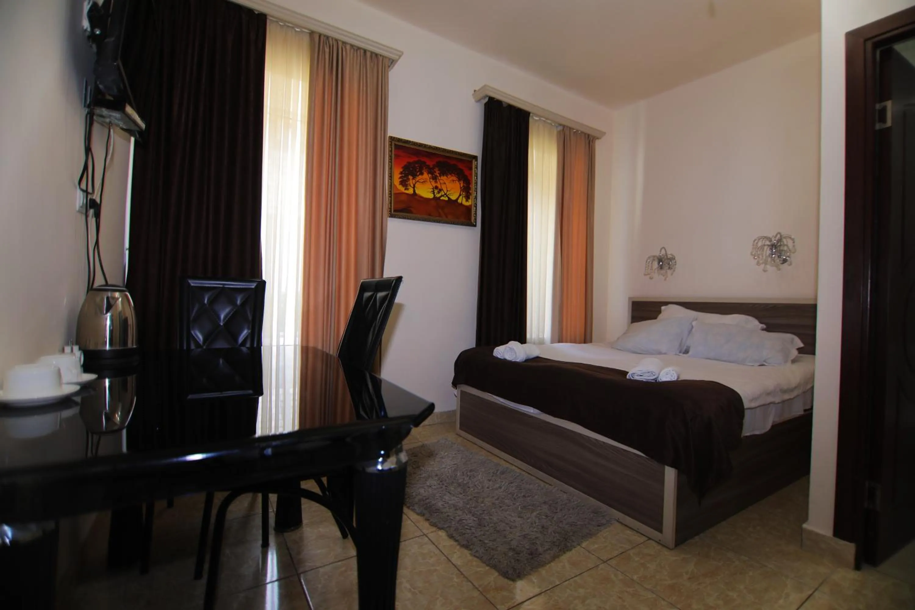 Bed in Comfort House Hotel