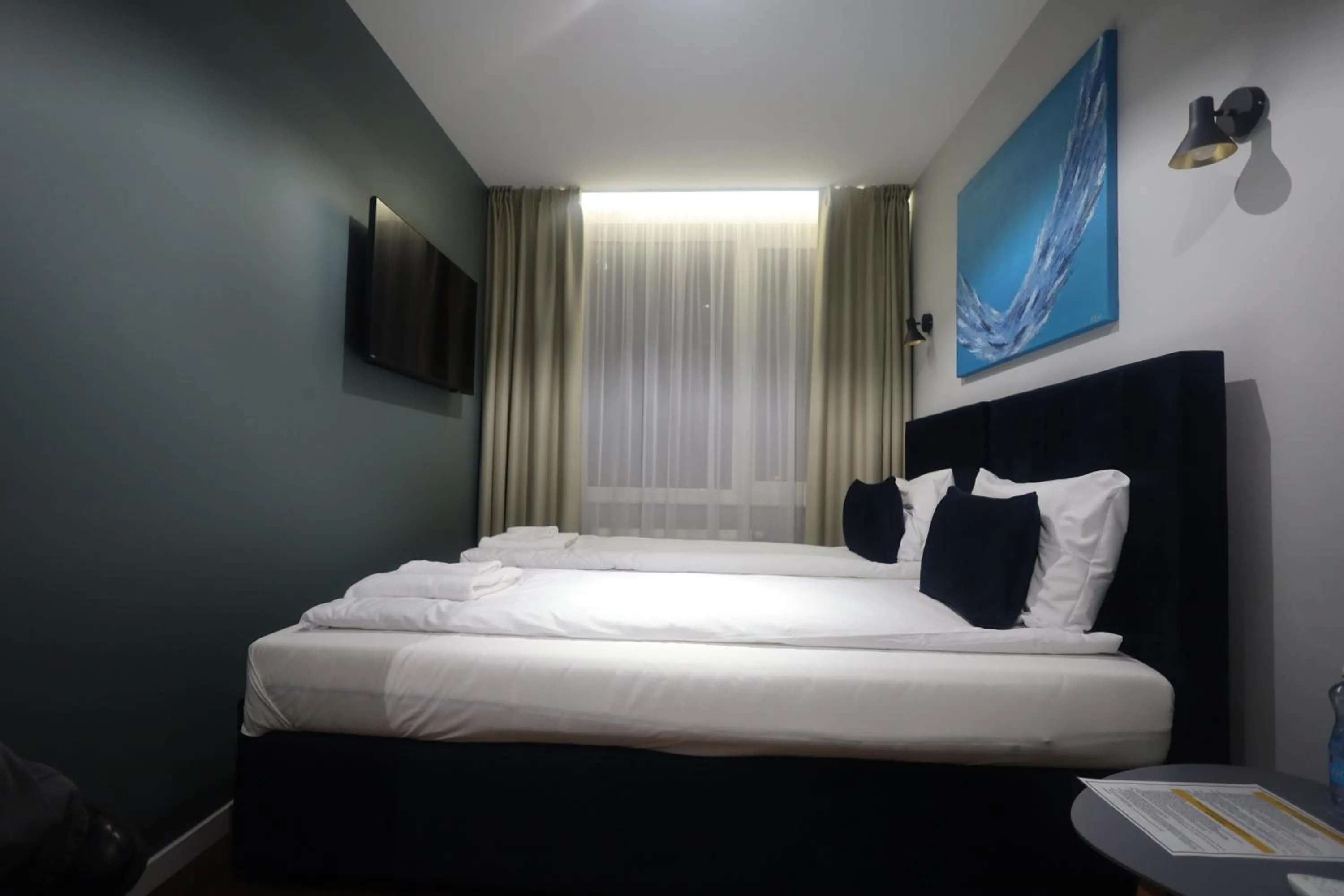 Bed in Luna Self Check-in Hotel Klaipeda