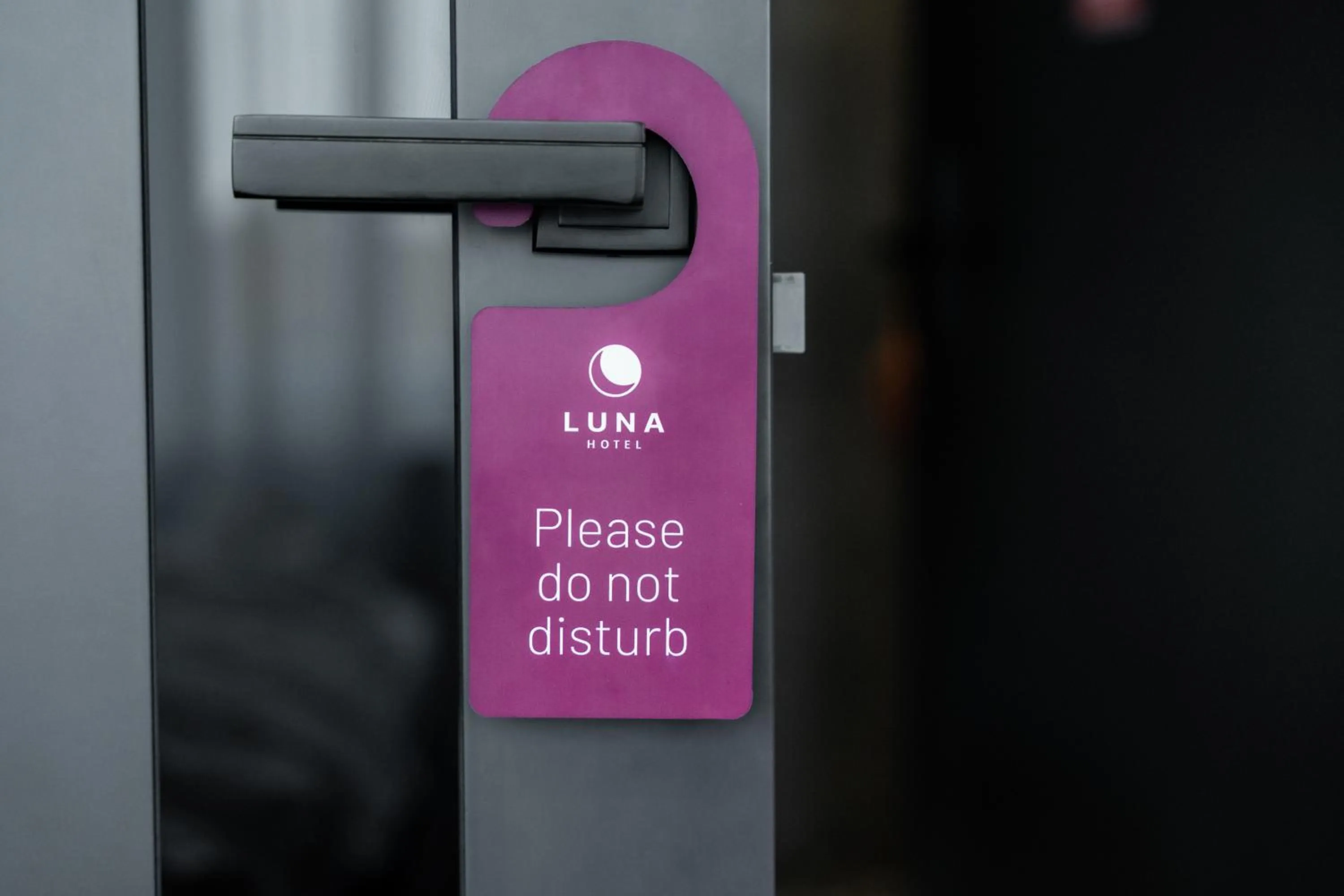 Property logo or sign in Luna Self Check-in Hotel Klaipeda