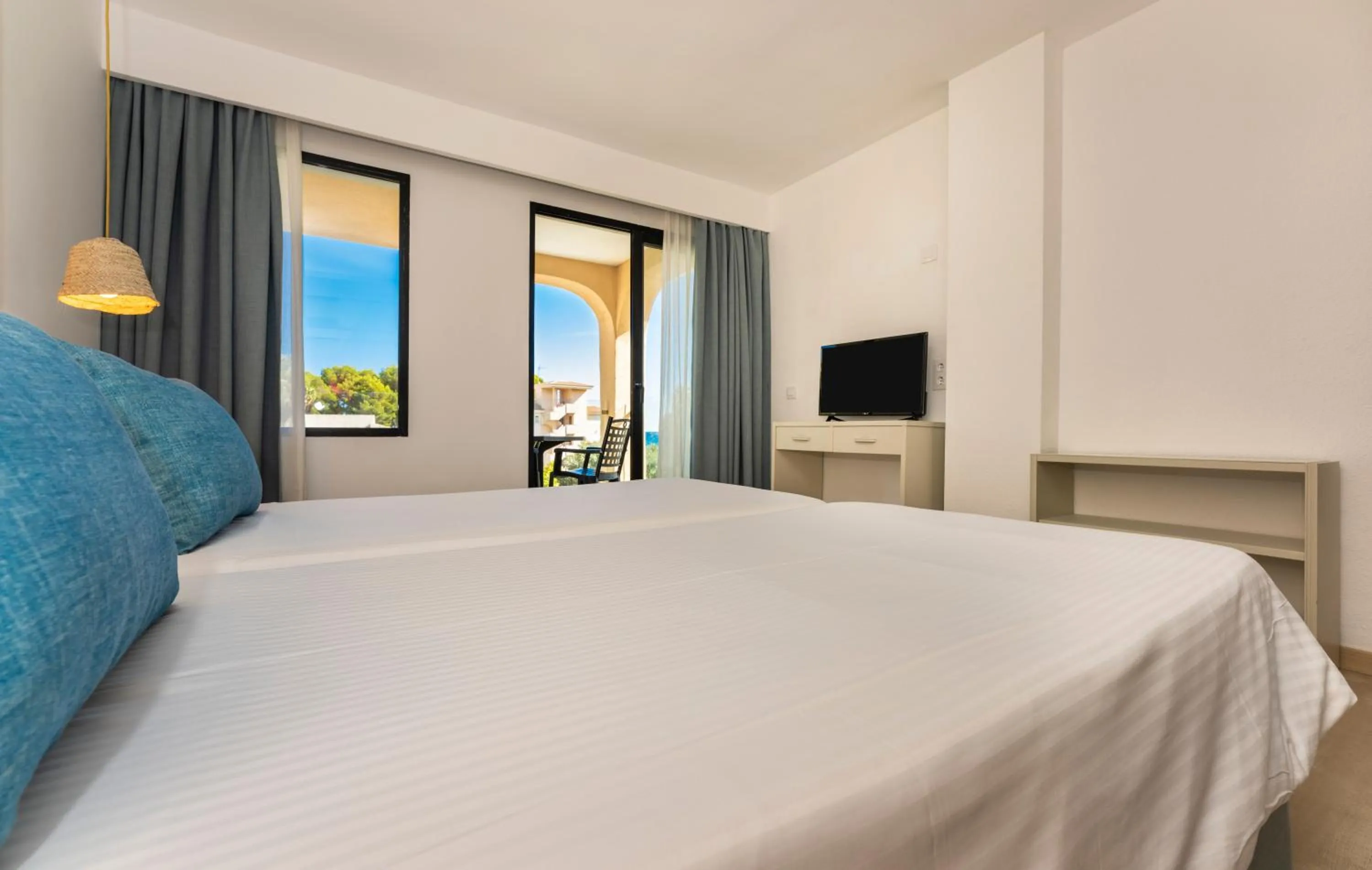 Bed in Apartamentos Sinfony