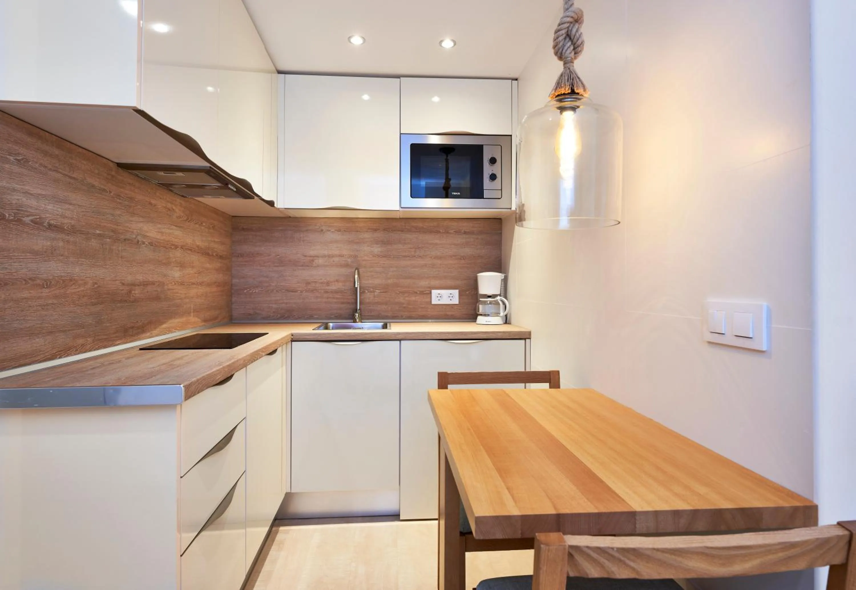 Kitchen or kitchenette in Apartamentos Sinfony