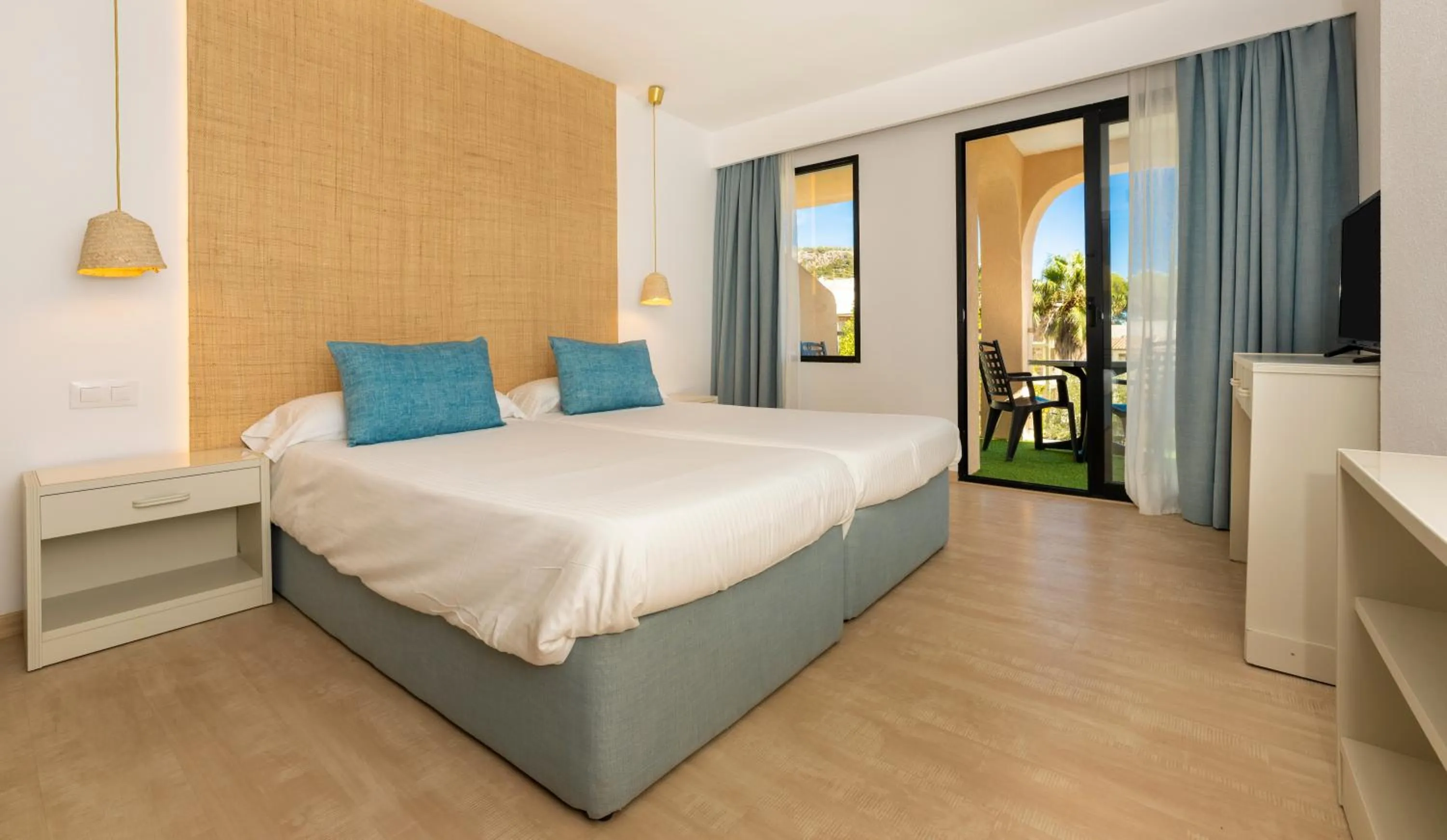 Bed in Apartamentos Sinfony