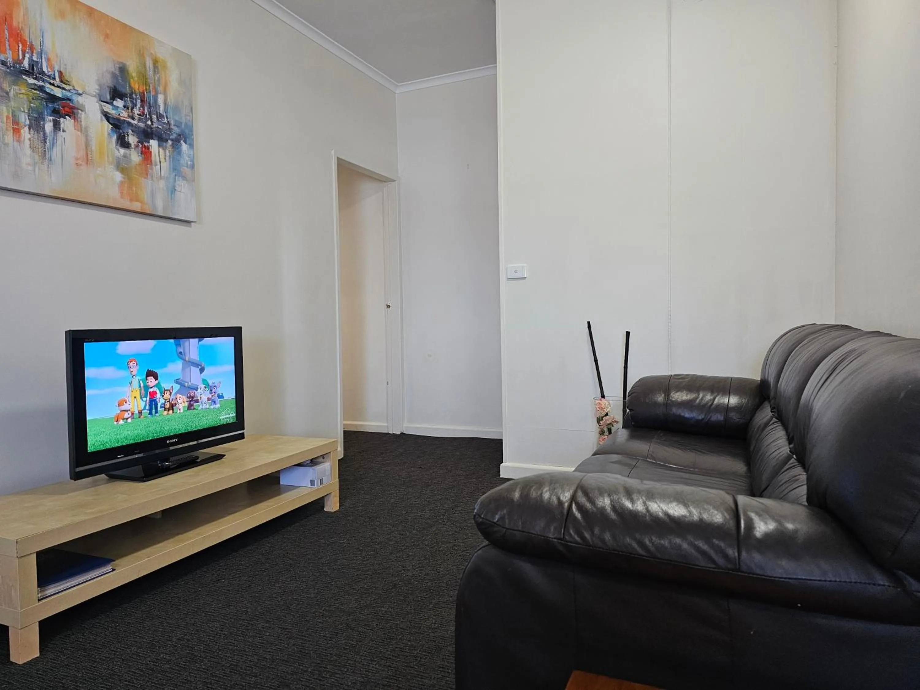 Communal lounge/ TV room in Country Lodge Motor Inn