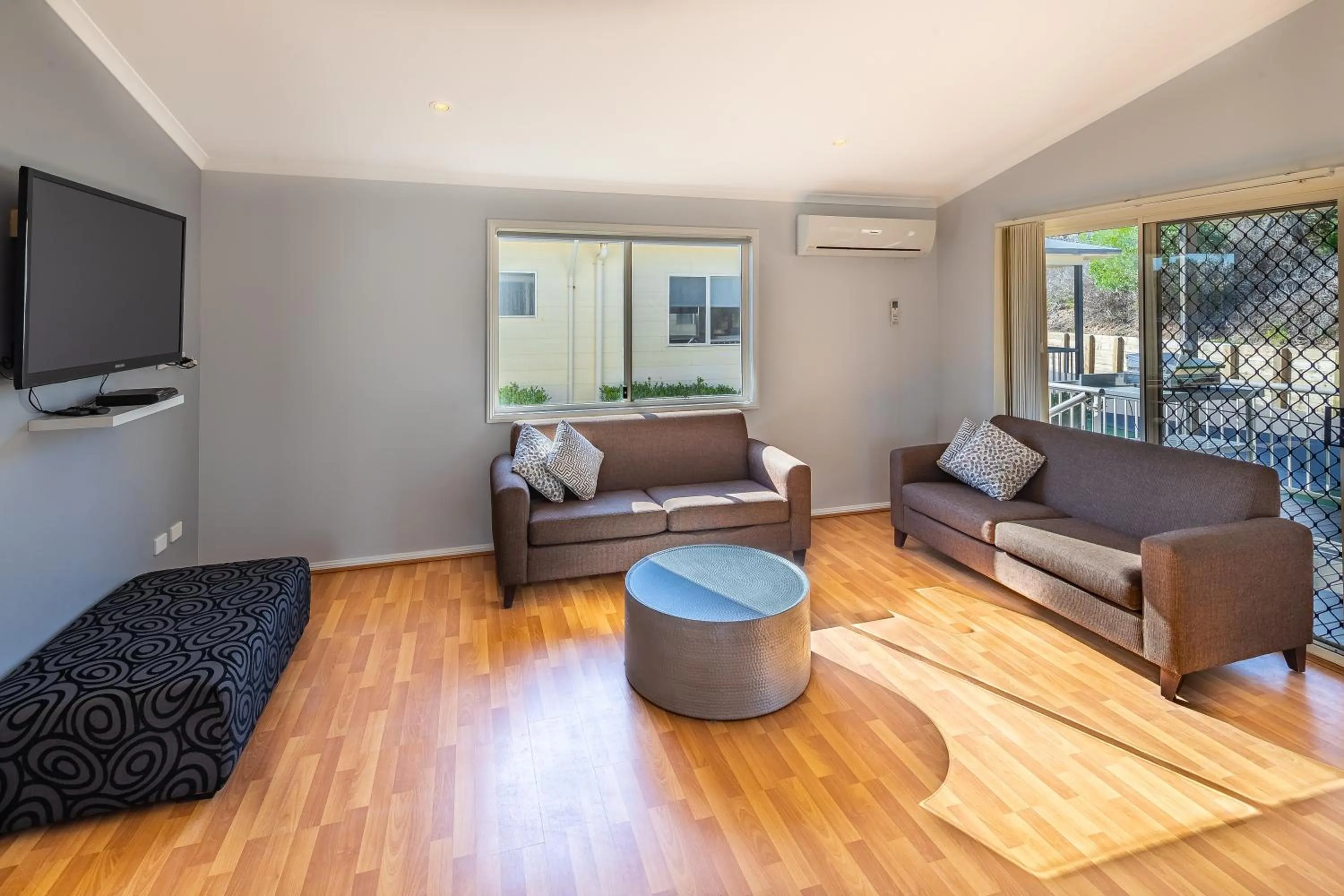 Communal lounge/ TV room in Ingenia Holidays One Mile Beach