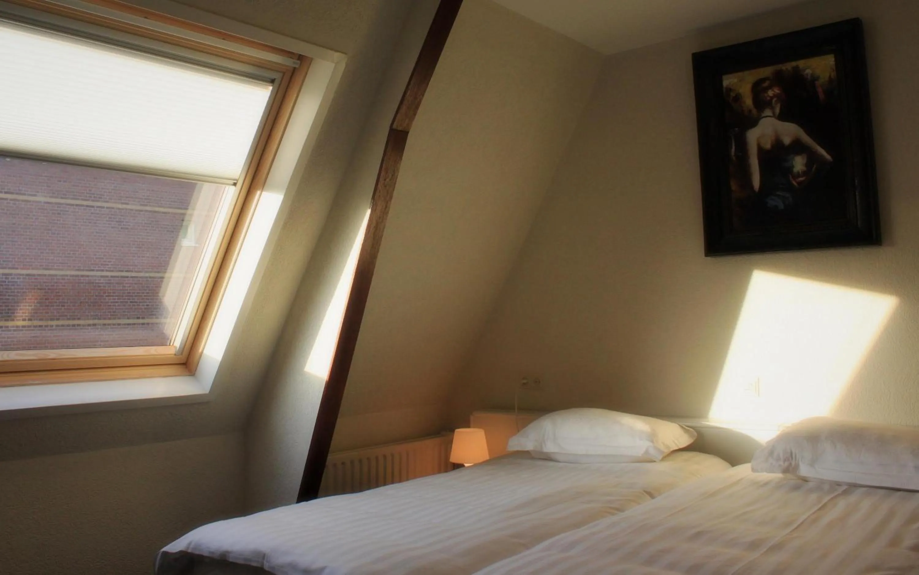 Bed in New City Hotel Scheveningen