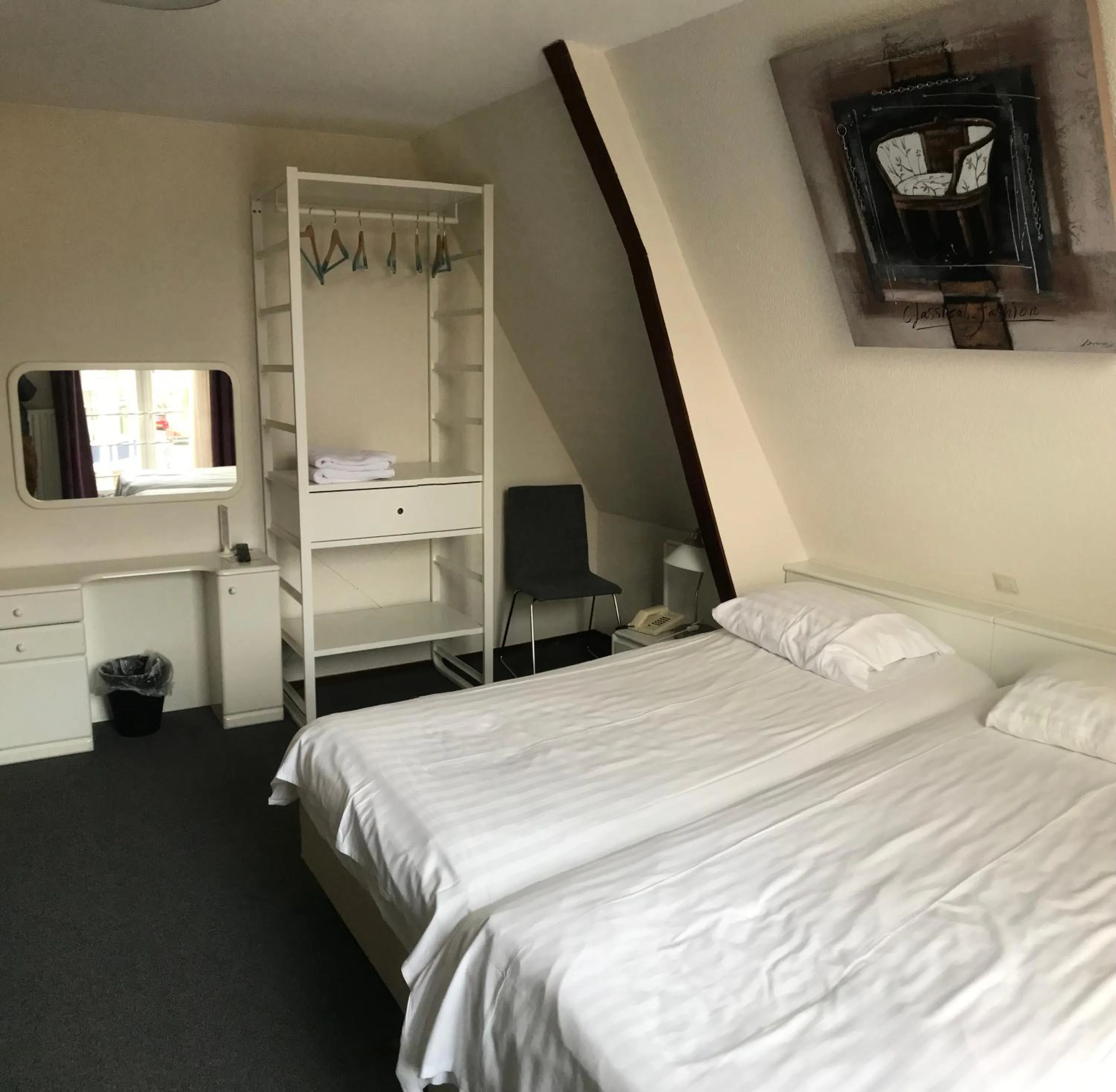 Bed in New City Hotel Scheveningen