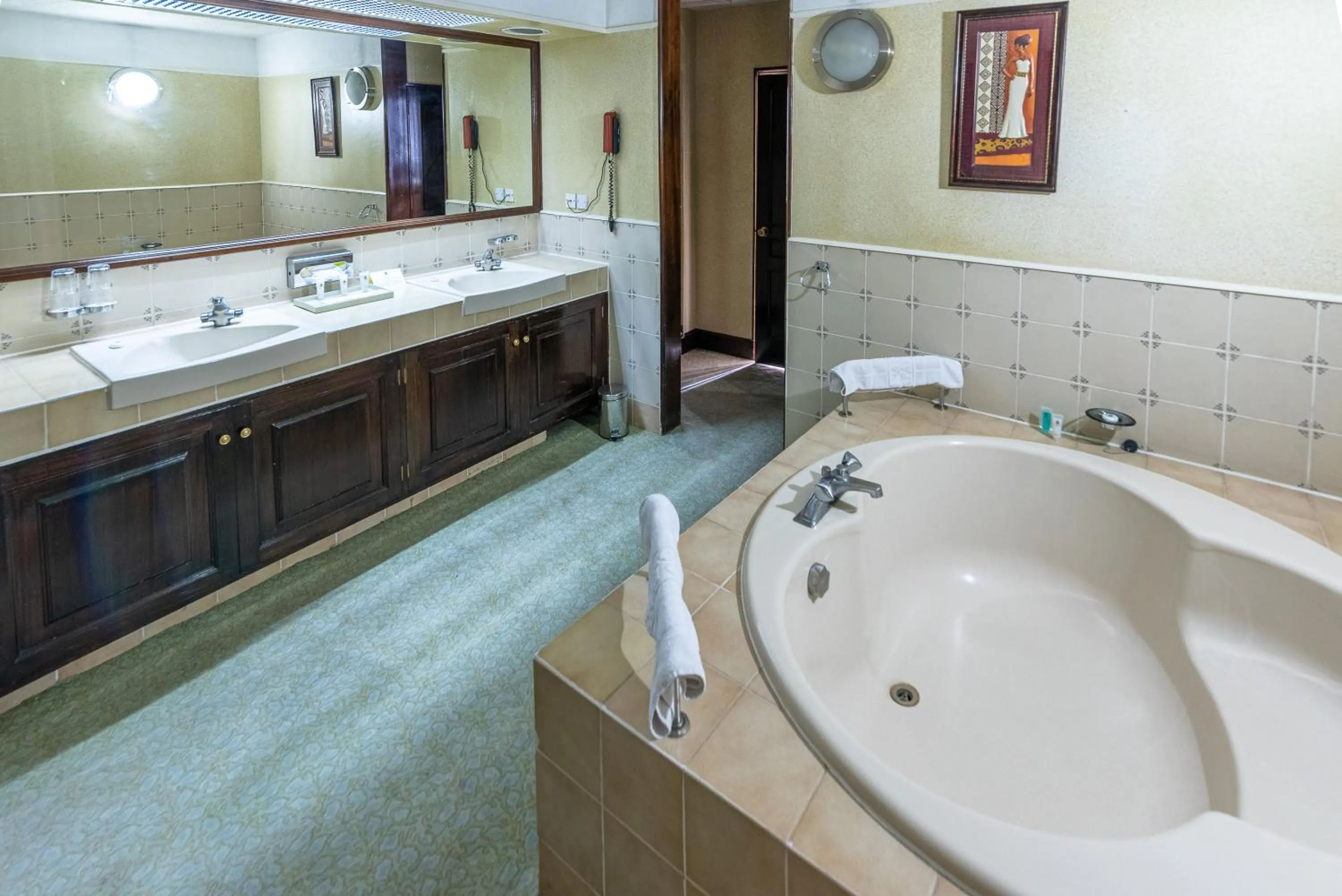 Bathroom in Nairobi Safari Club by Swiss-Belhotel