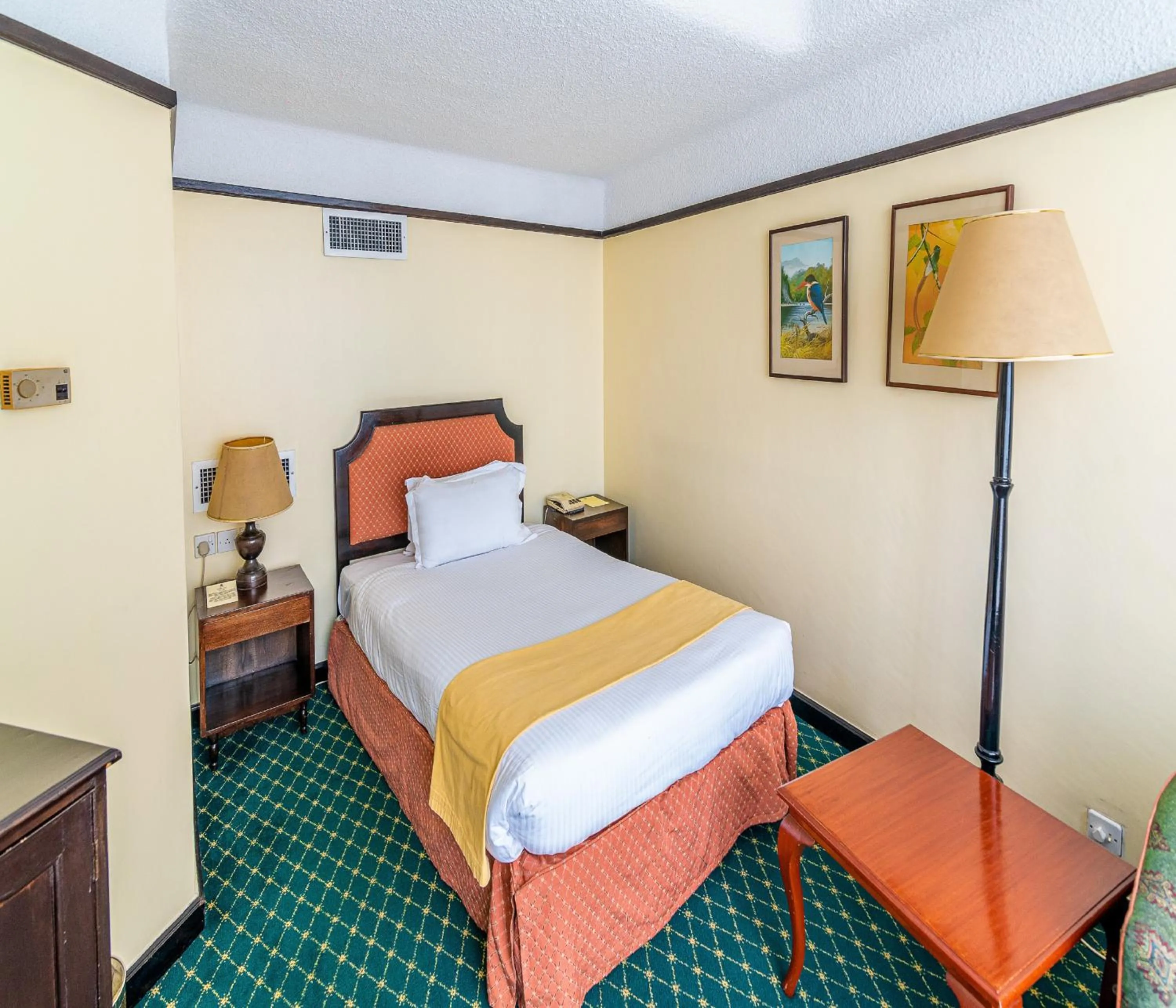 Bed in Nairobi Safari Club by Swiss-Belhotel