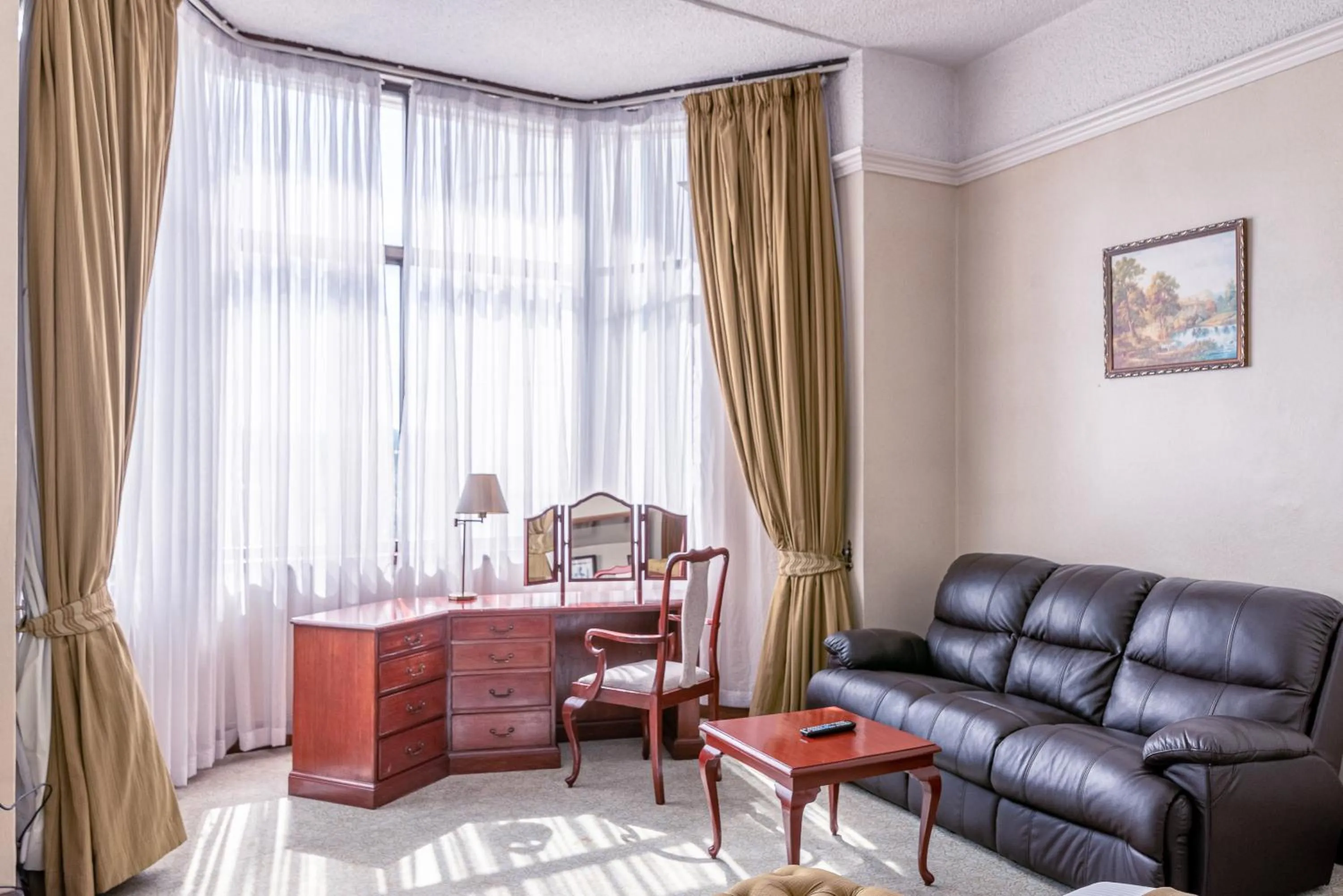 Seating area in Nairobi Safari Club by Swiss-Belhotel