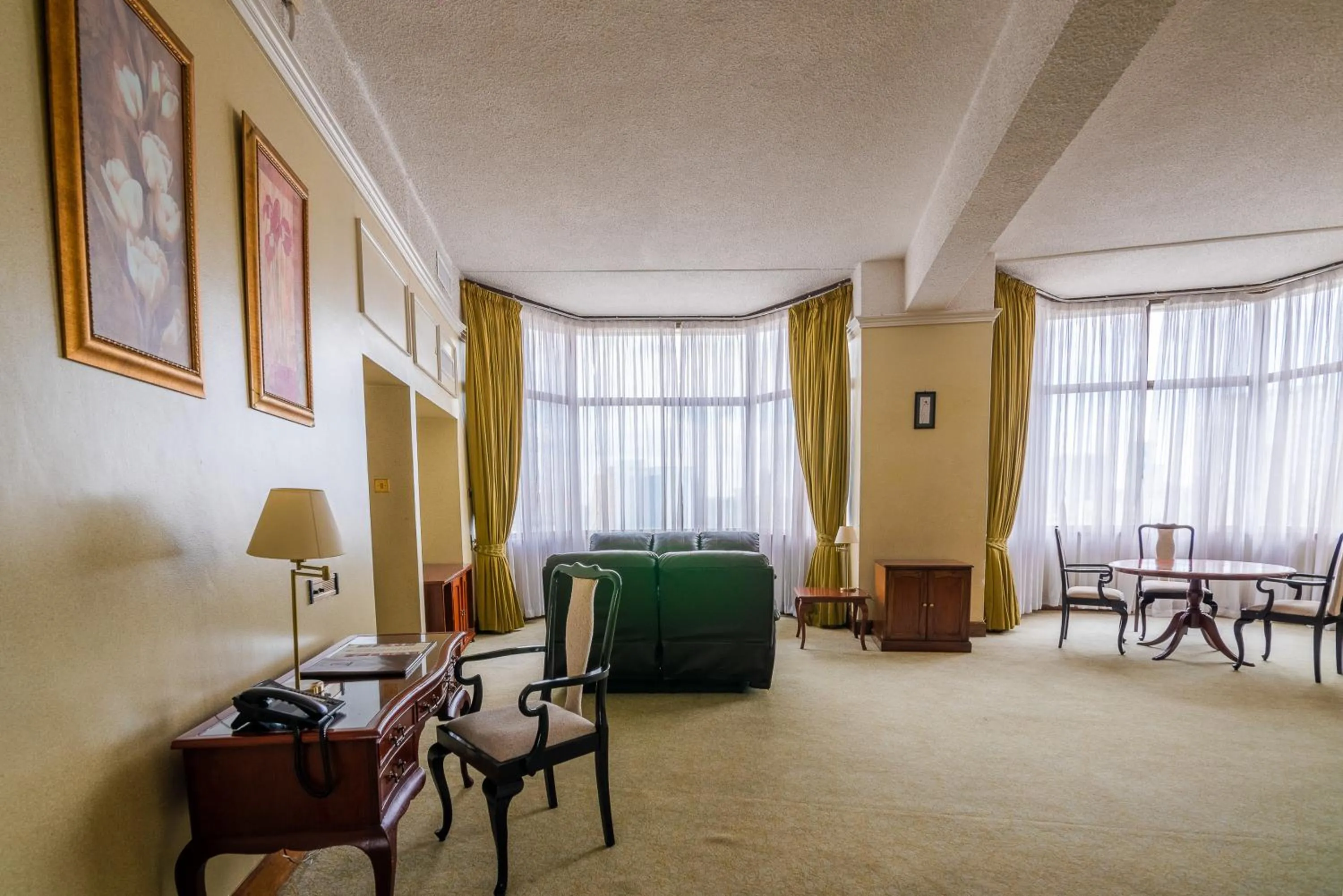 Seating area in Nairobi Safari Club by Swiss-Belhotel