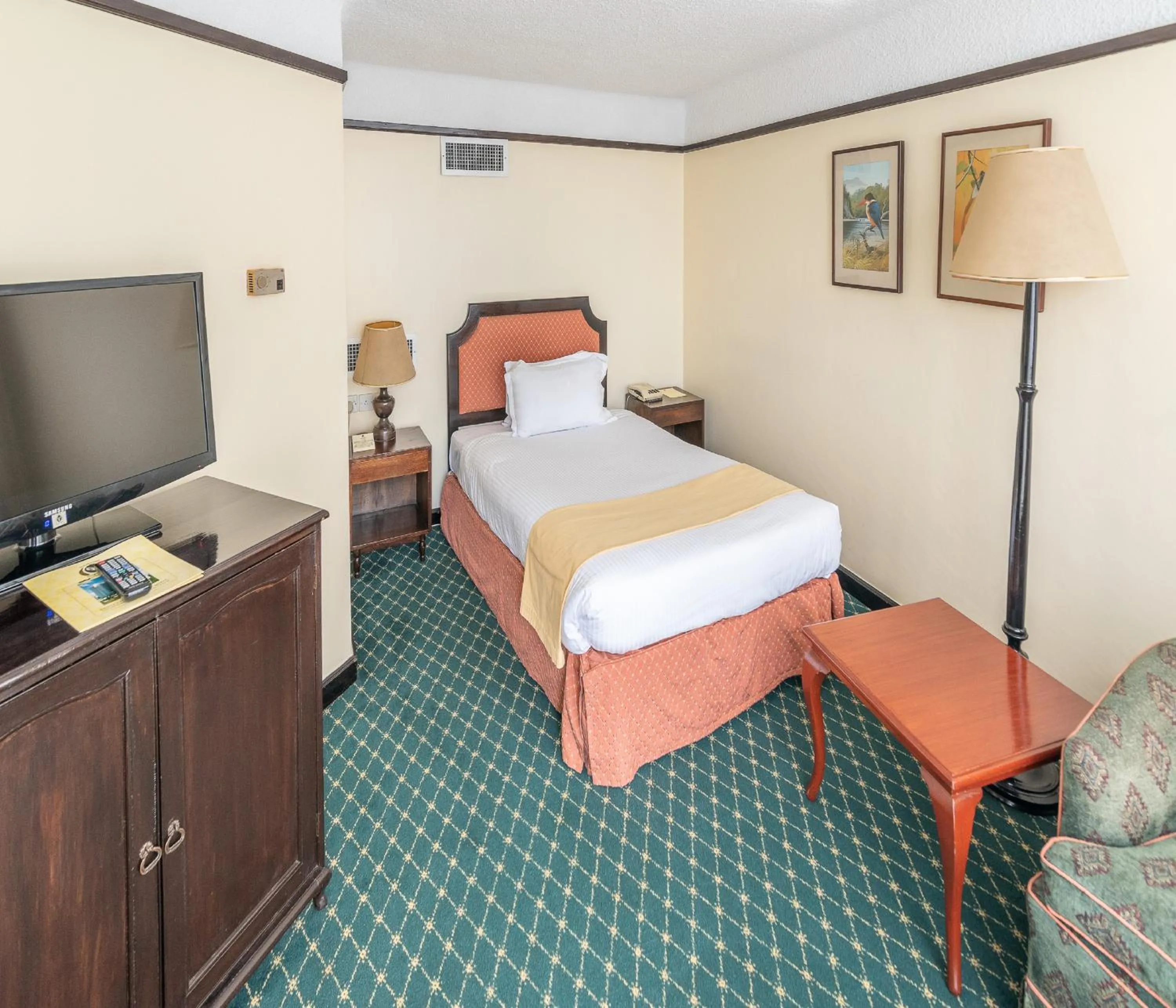 Bed in Nairobi Safari Club by Swiss-Belhotel