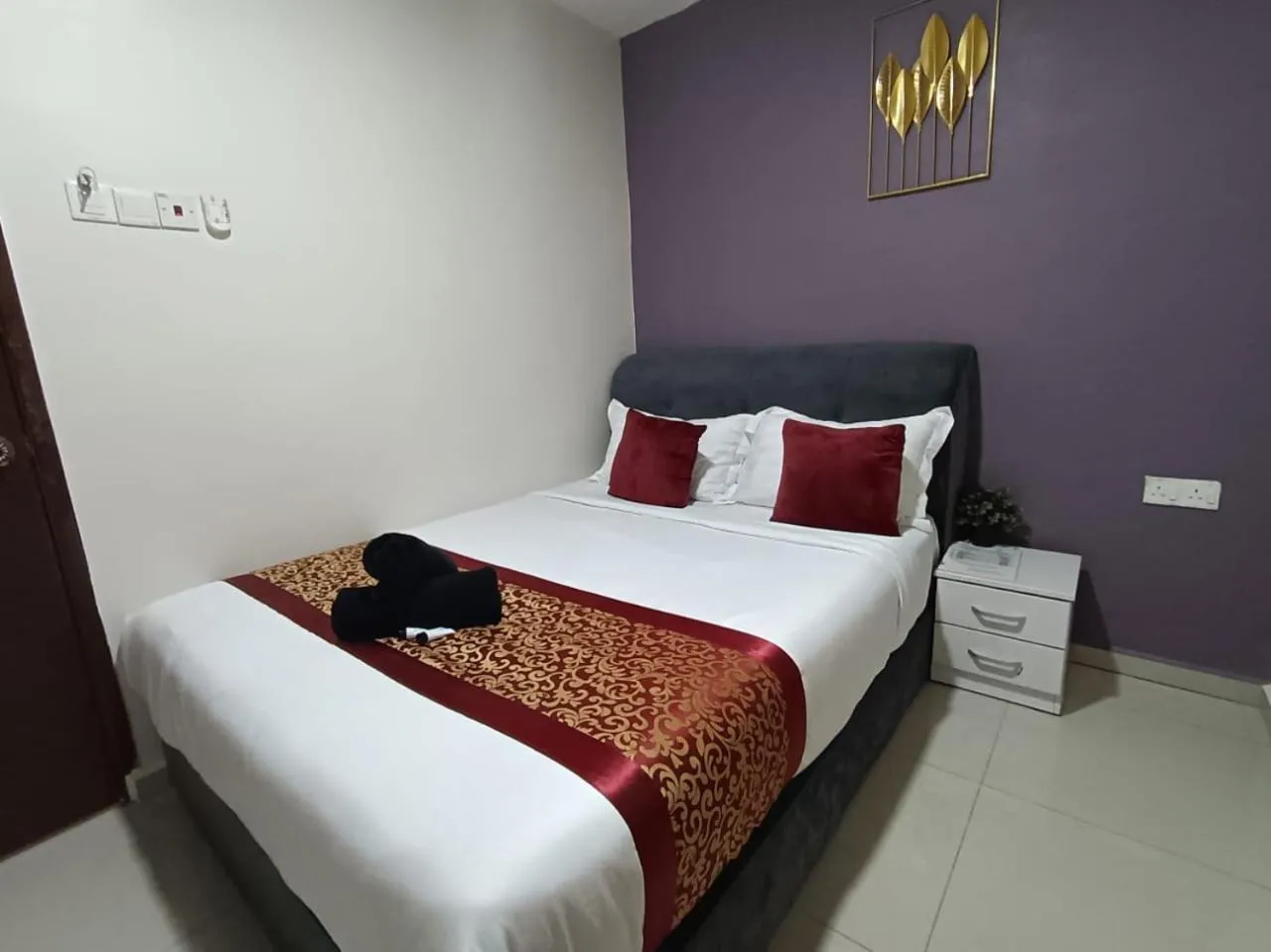 Bed in L Ferringhi Hotel