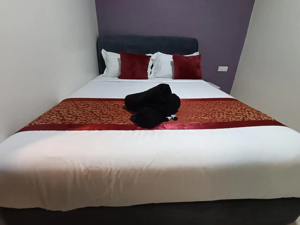 Bed in L Ferringhi Hotel