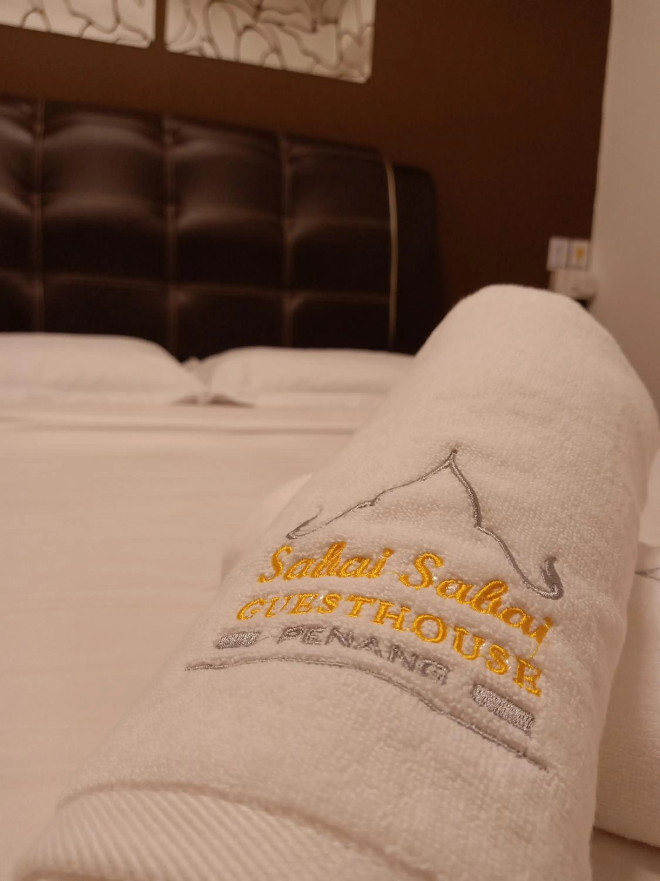 Bed in Sabai Sabai Guesthouse in Bayan Lepas