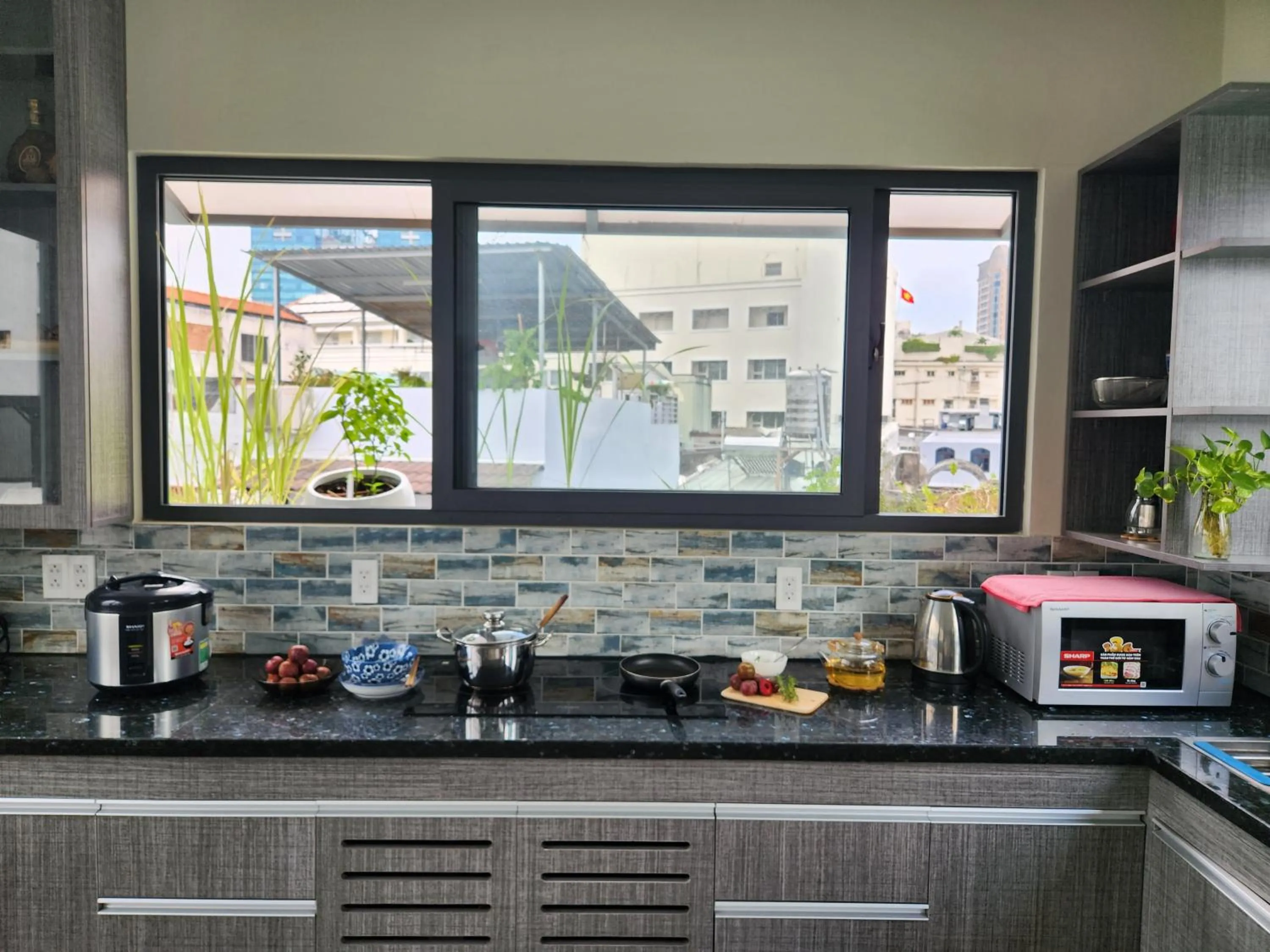 Kitchen or kitchenette in LalaHouse Spring Apartment - Saigon Center