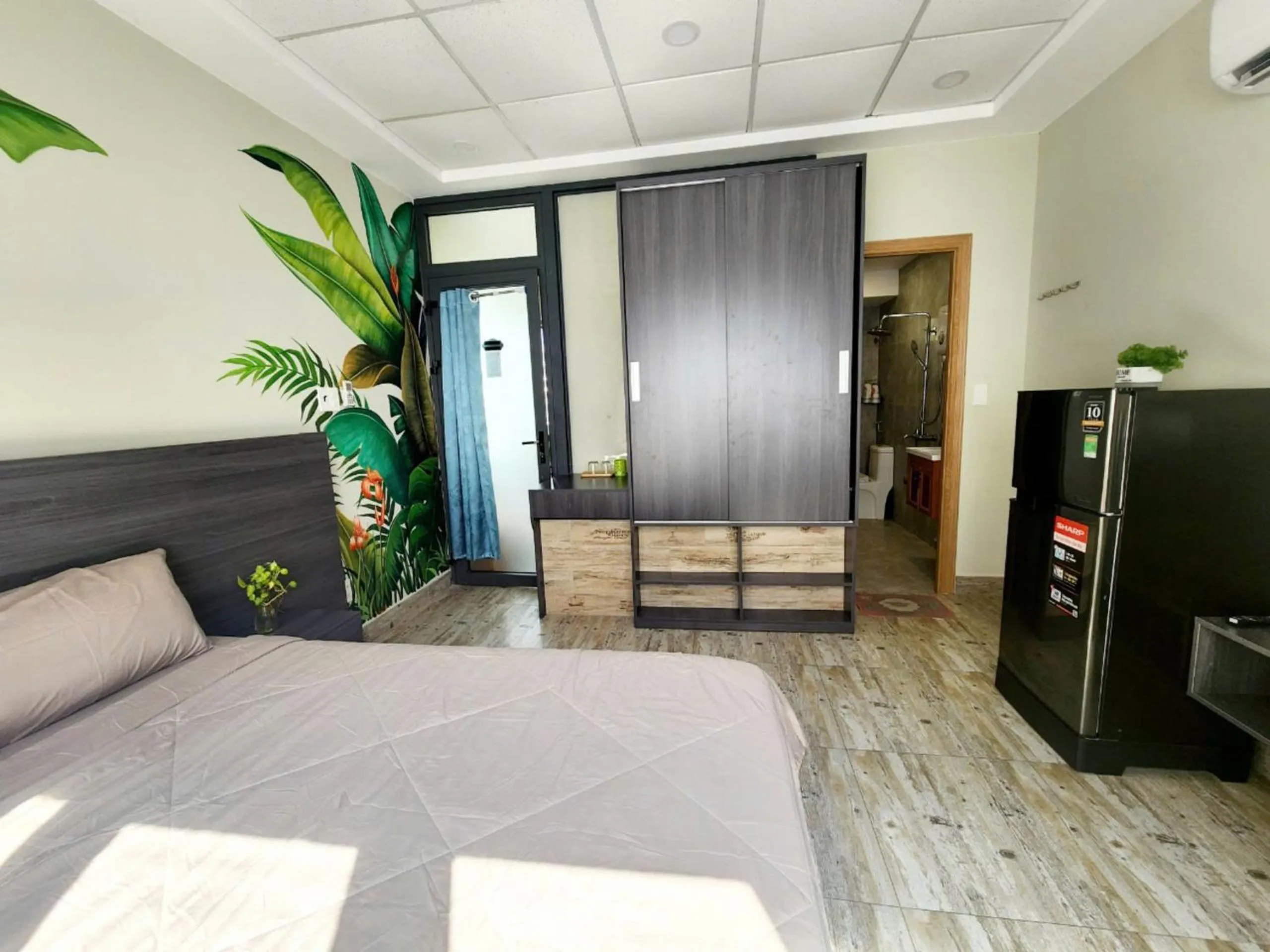 Photo of the whole room in LalaHouse Spring Apartment - Saigon Center