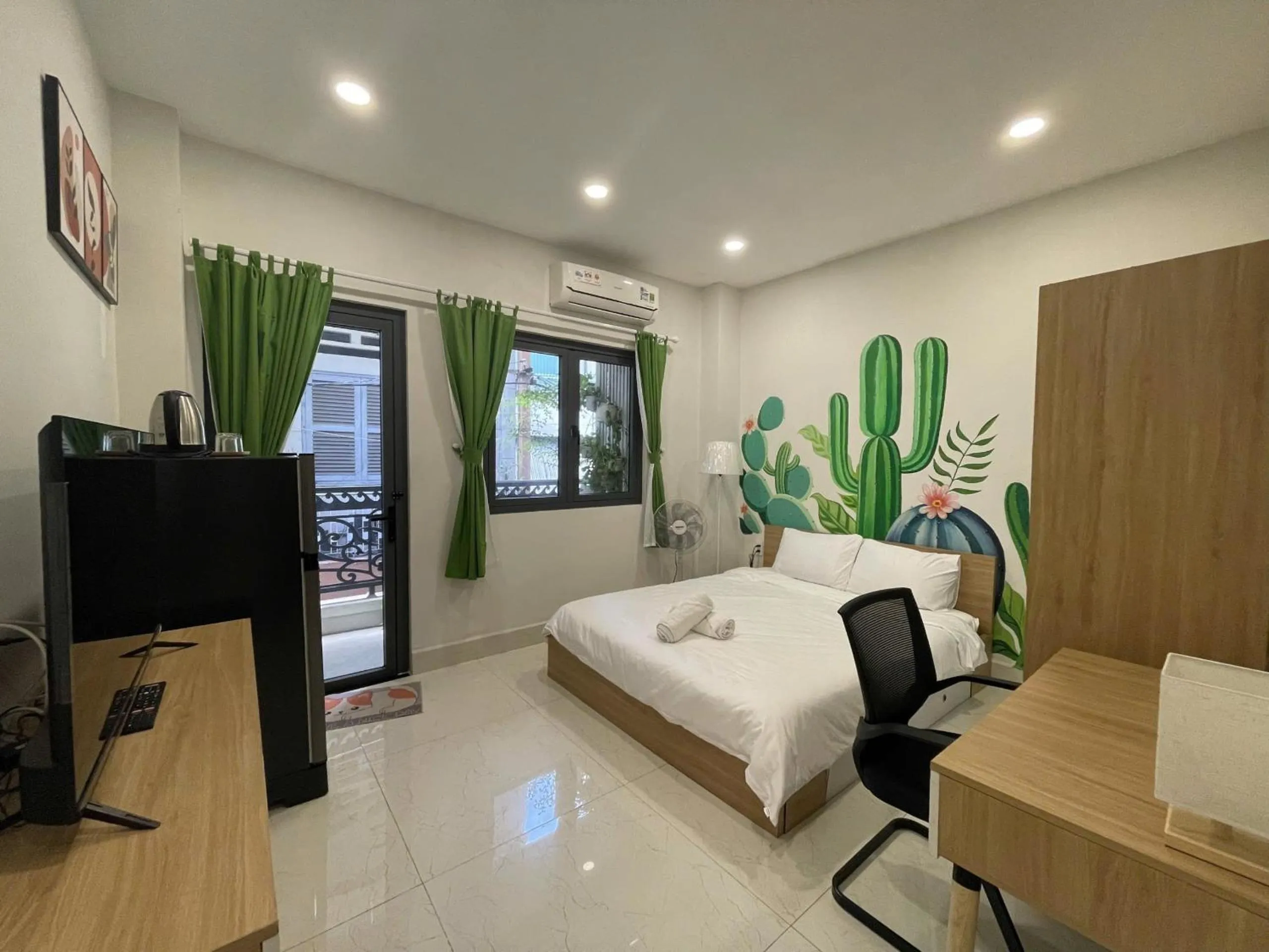 Photo of the whole room in LalaHouse Spring Apartment - Saigon Center