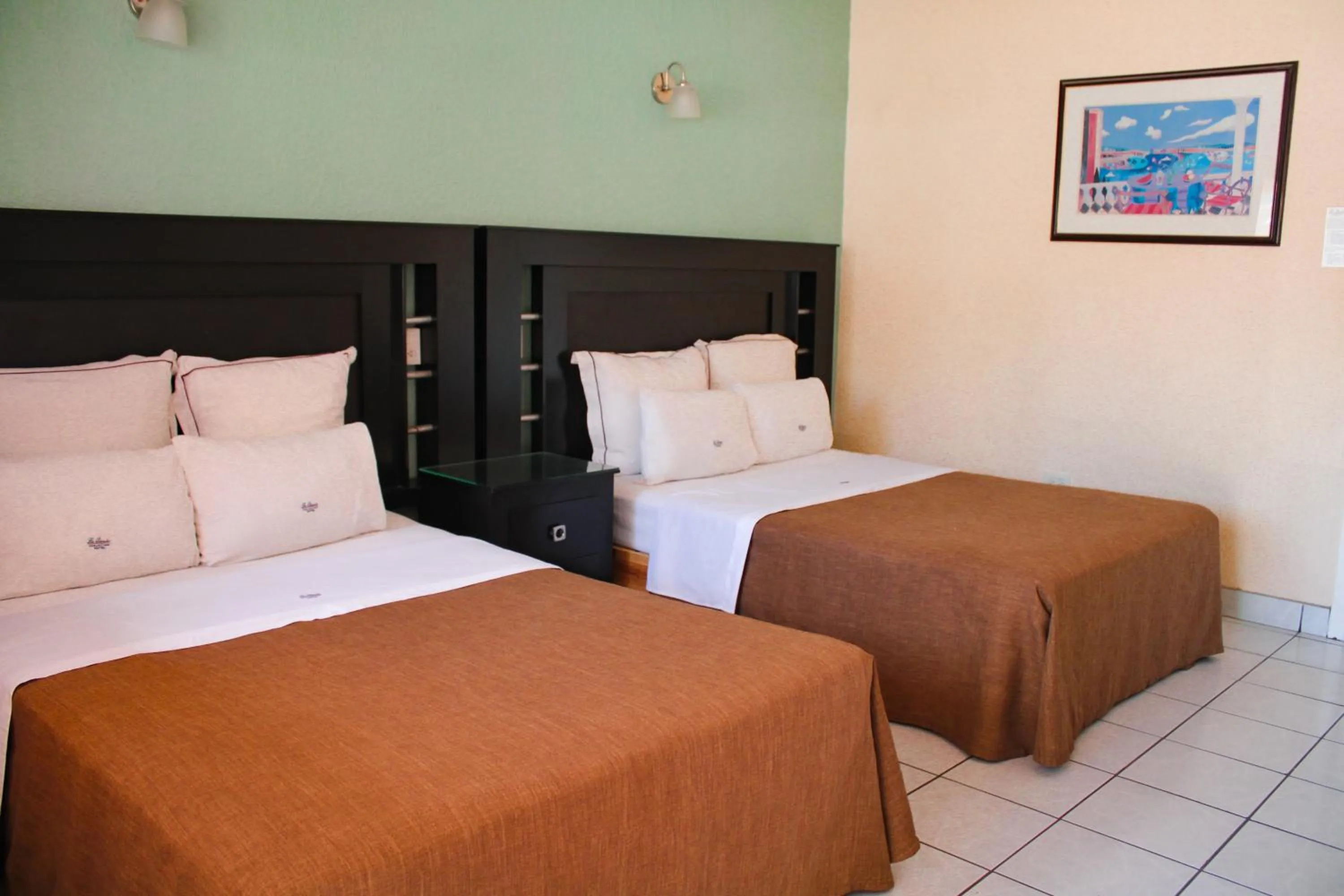 Bed in Hotel La Quinta Posada Real