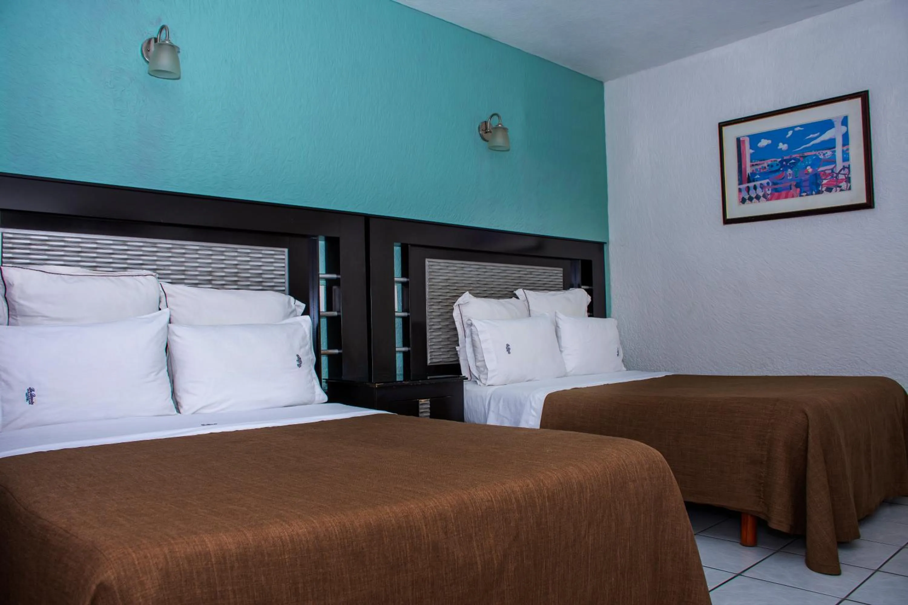 Bed in Hotel La Quinta Posada Real