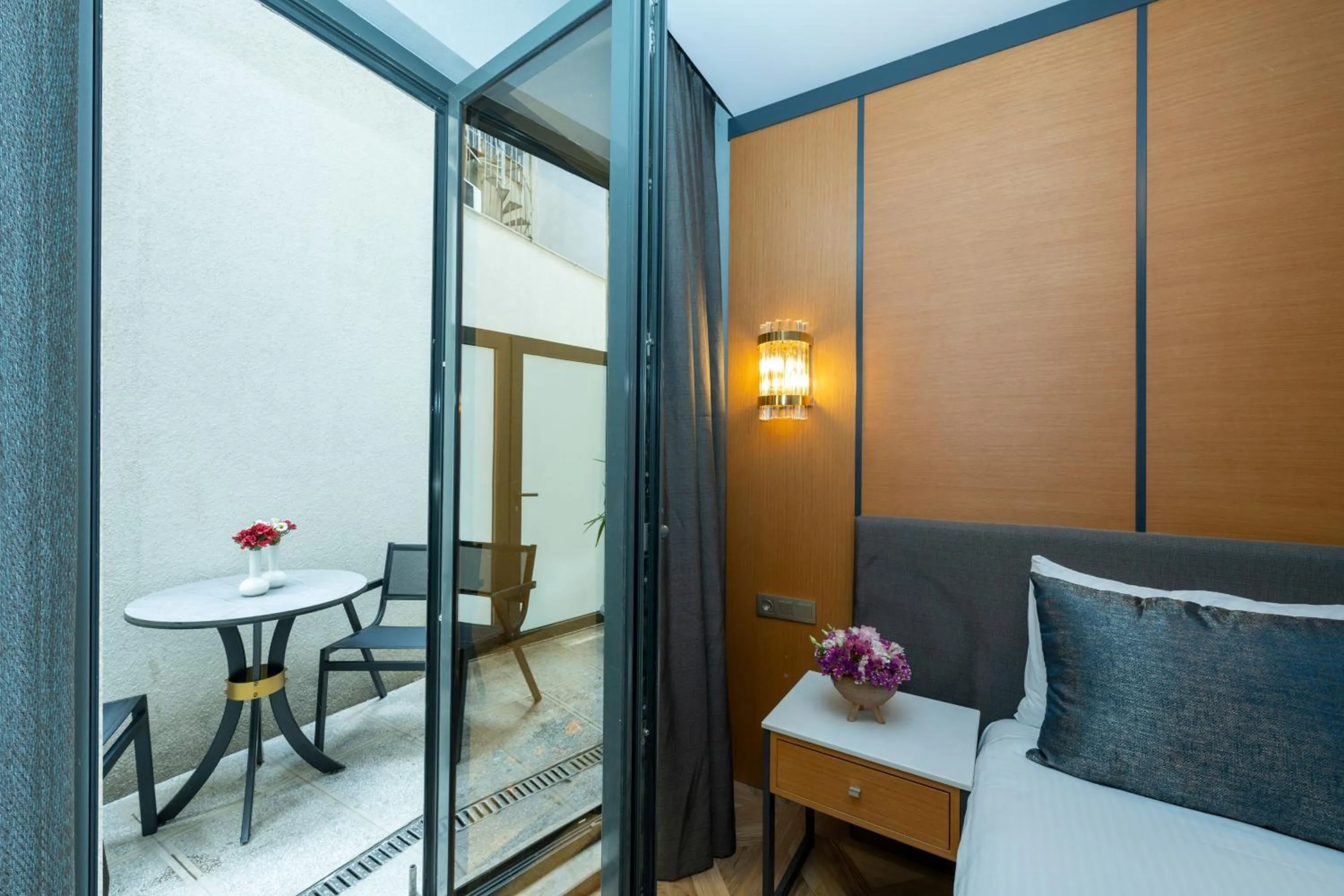 Balcony/Terrace, Bed in Freya Hotel