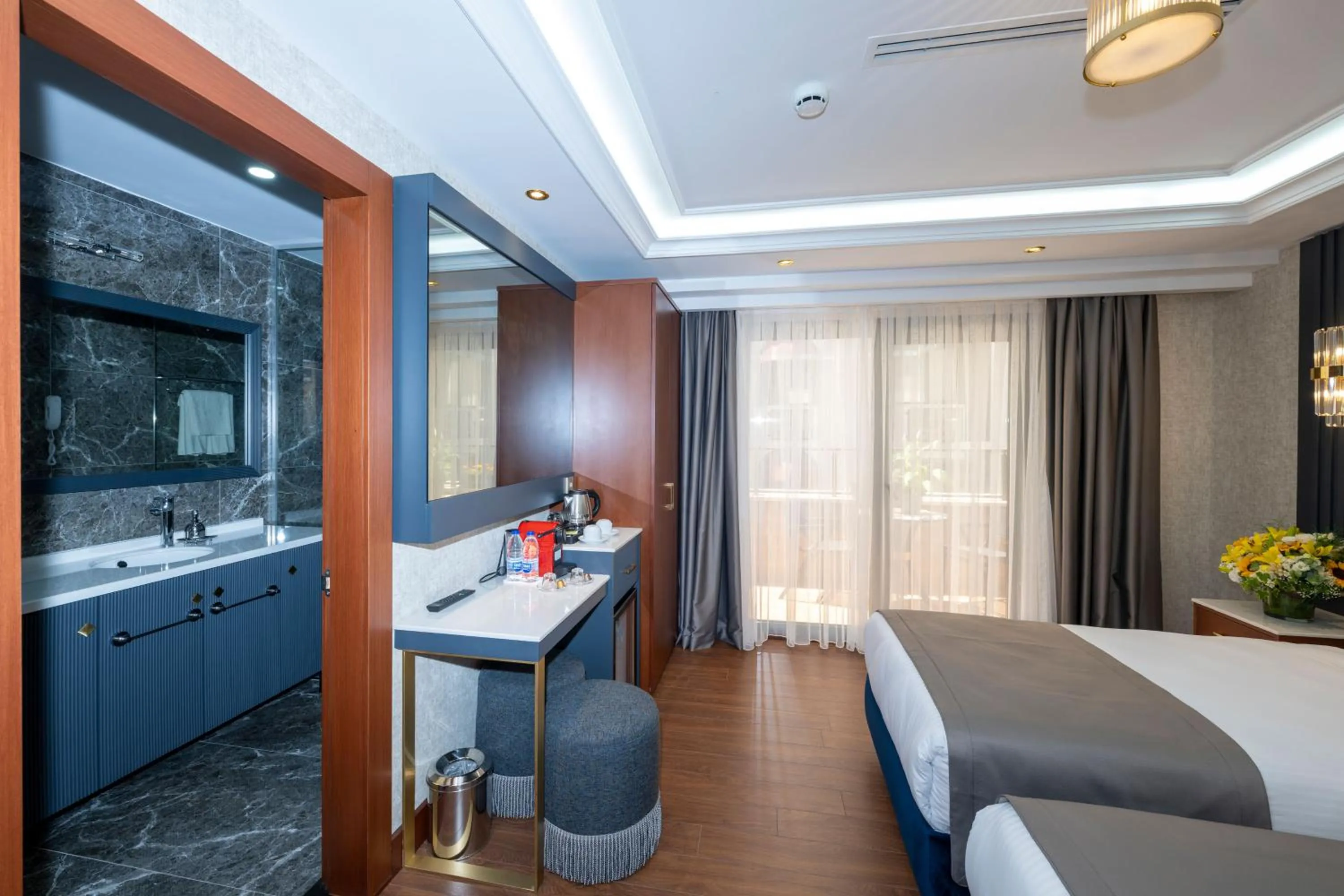 Bathroom, Bed in Freya Hotel