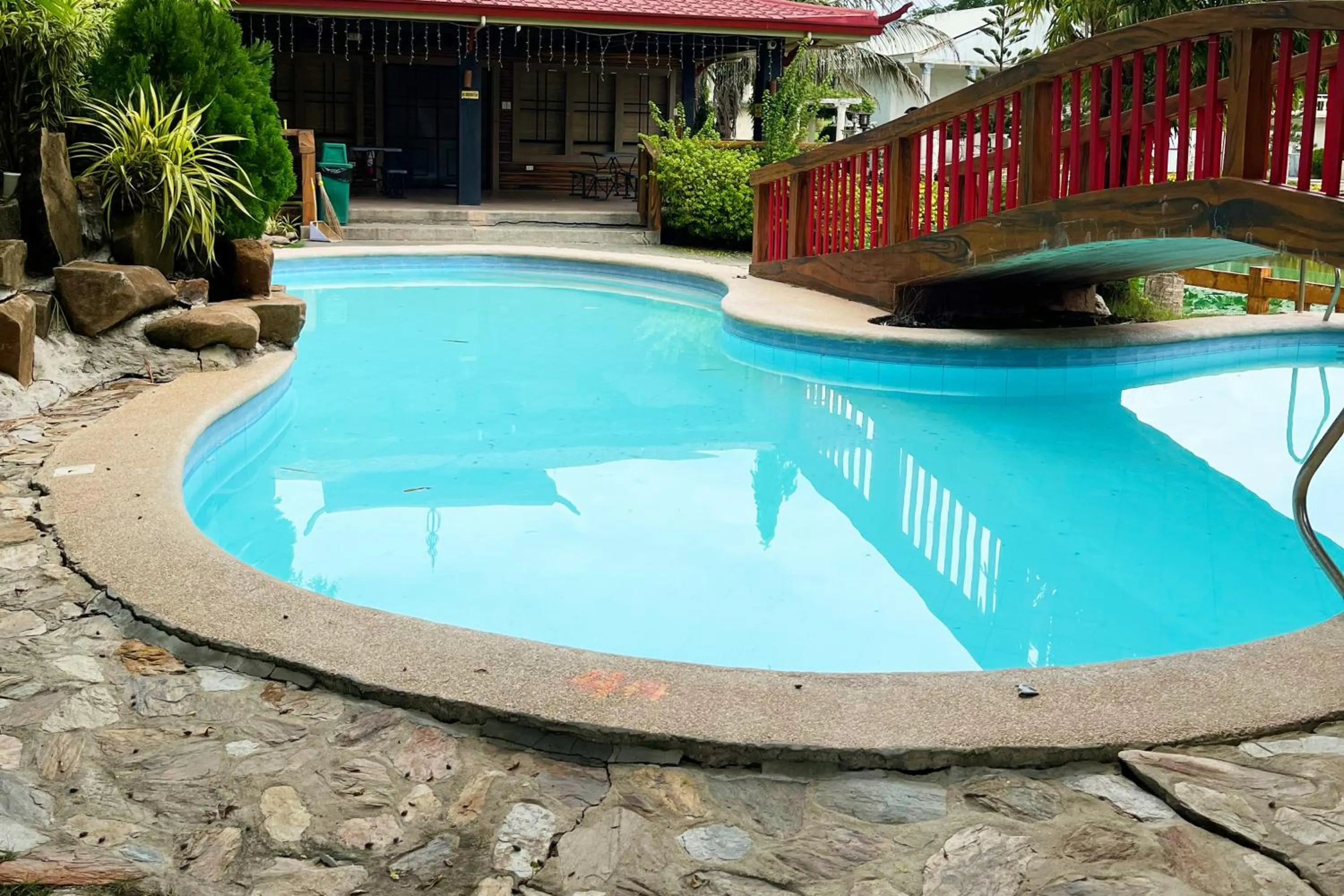 Swimming pool in Torres Farm Resort powered by Cocotel
