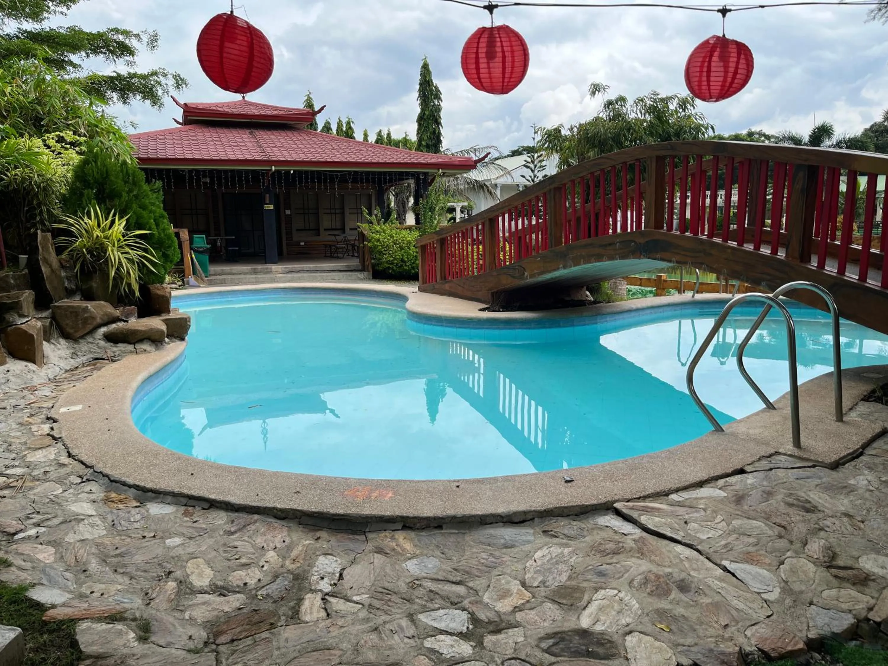 Swimming pool in Torres Farm Resort powered by Cocotel