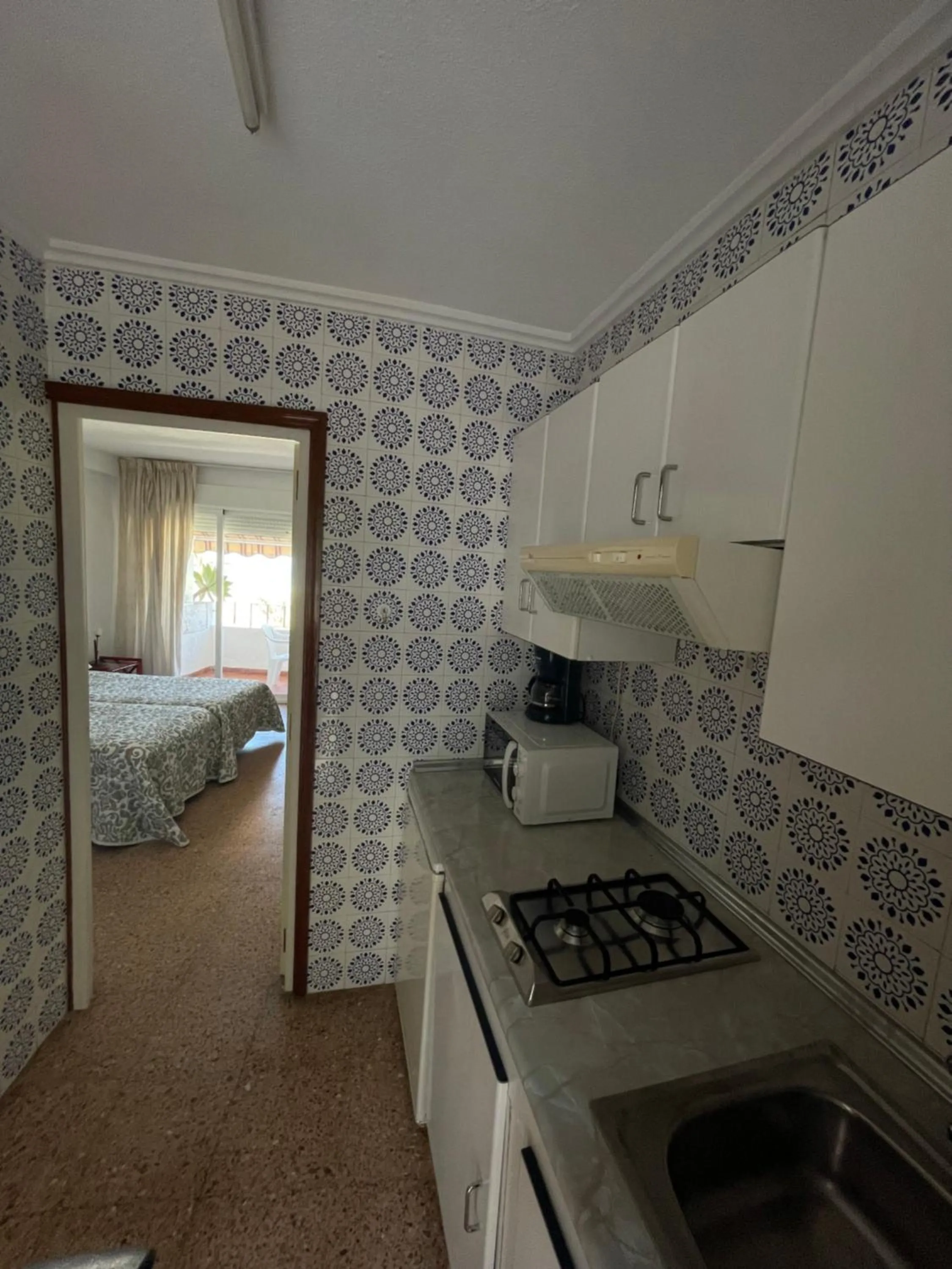 Kitchen or kitchenette, Bed in Apartamentos Bahia