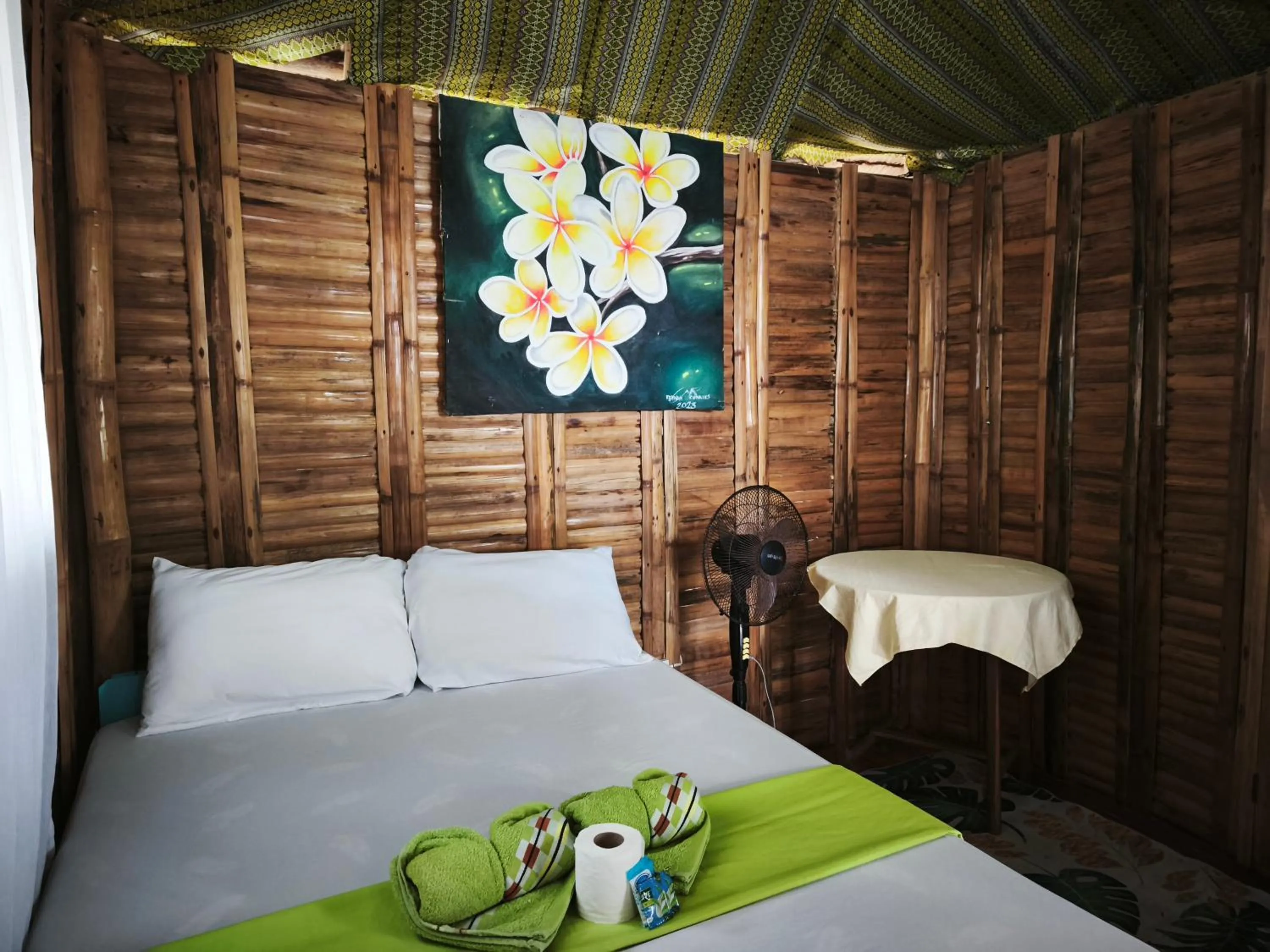 Bed in NATUA'S BEACH RESORT