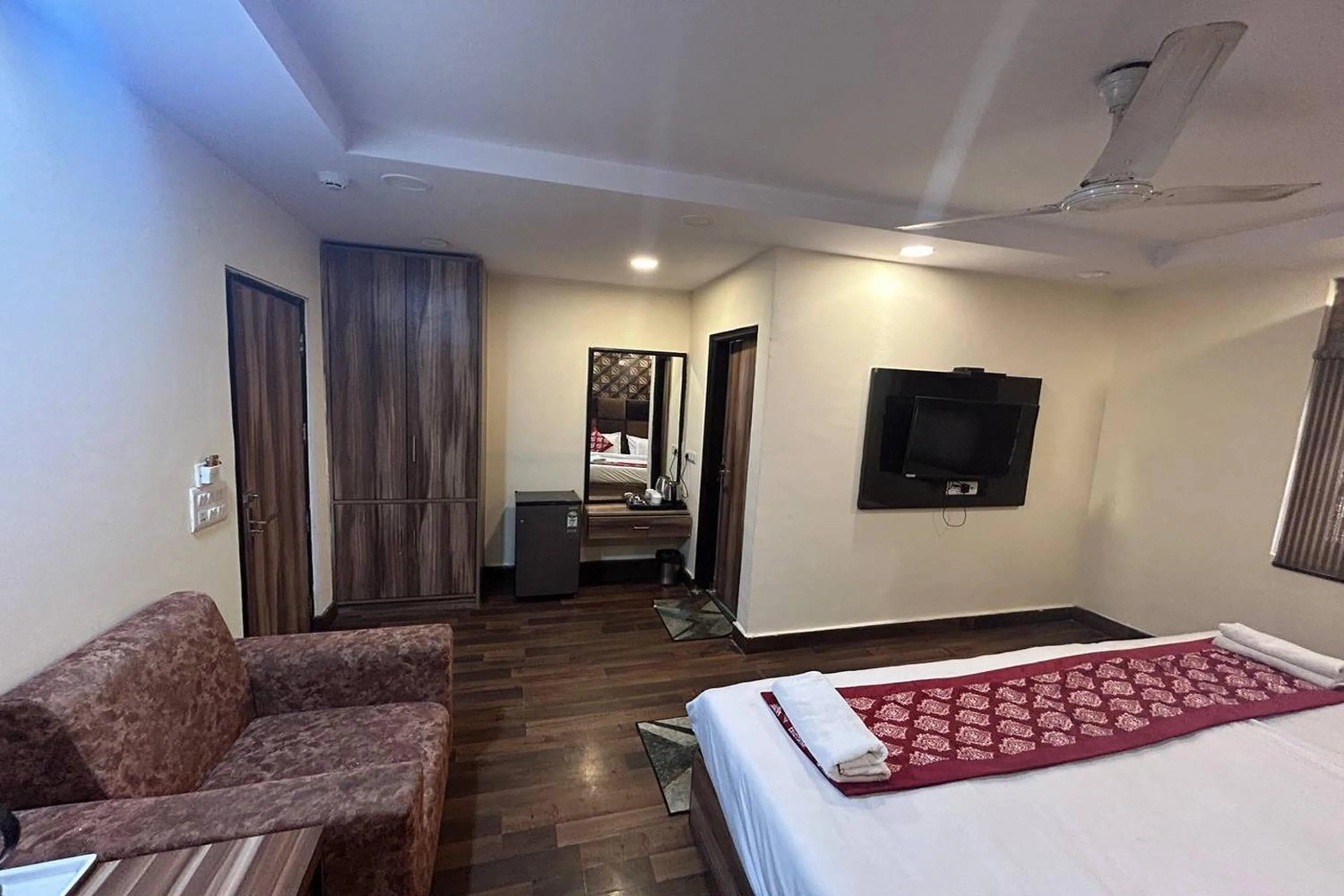 Bed in HOTEL SINGH CONTINETAL