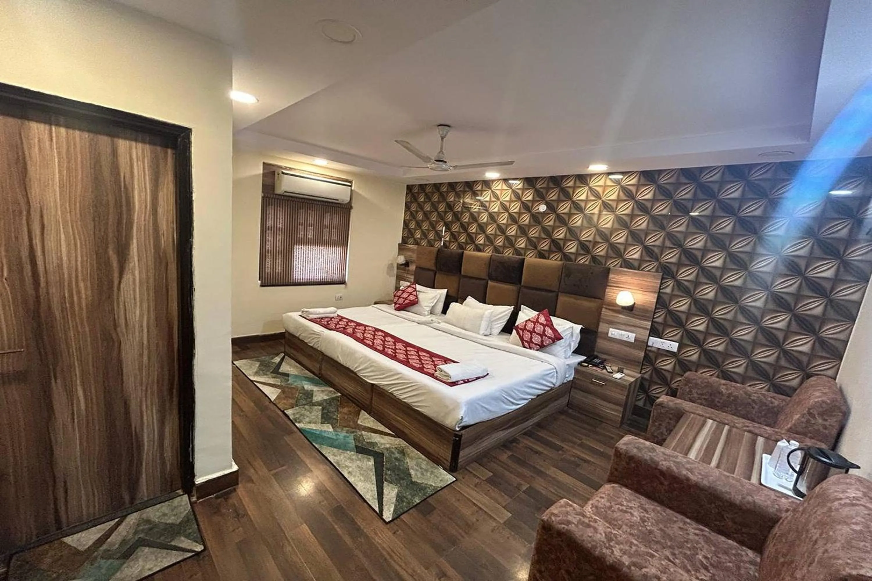 Bed in HOTEL SINGH CONTINETAL