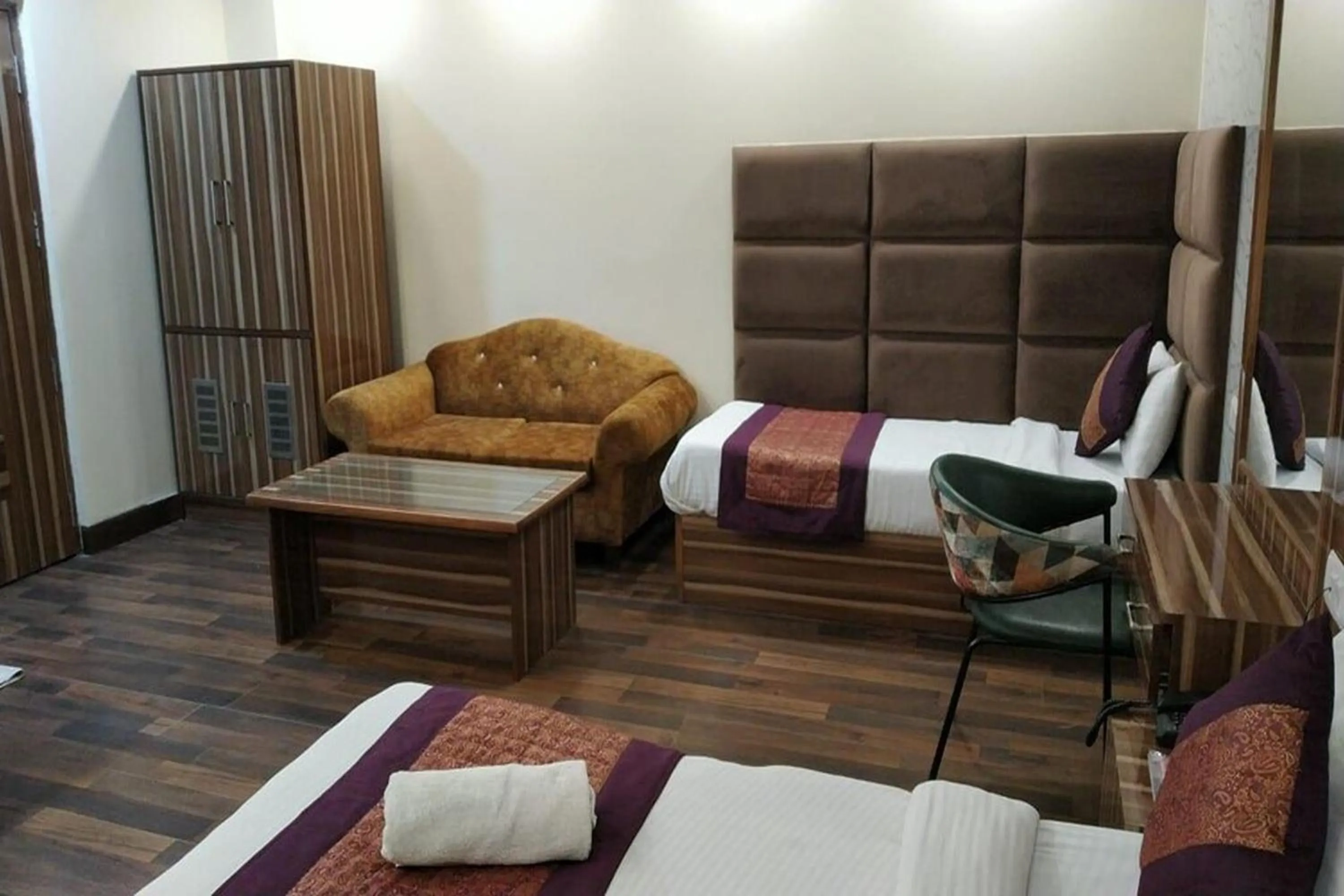 Bed in HOTEL SINGH CONTINETAL