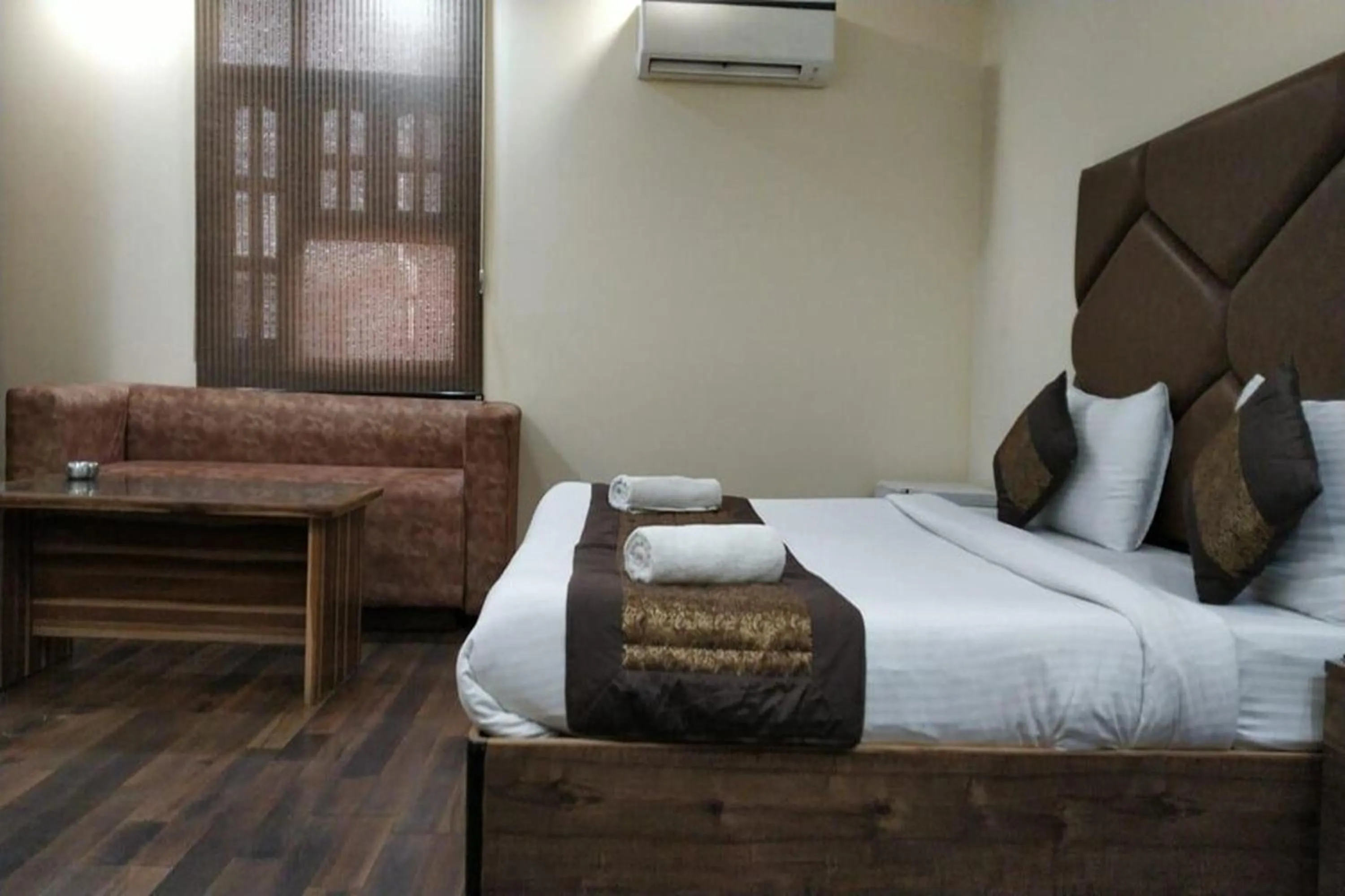 Bed in HOTEL SINGH CONTINETAL