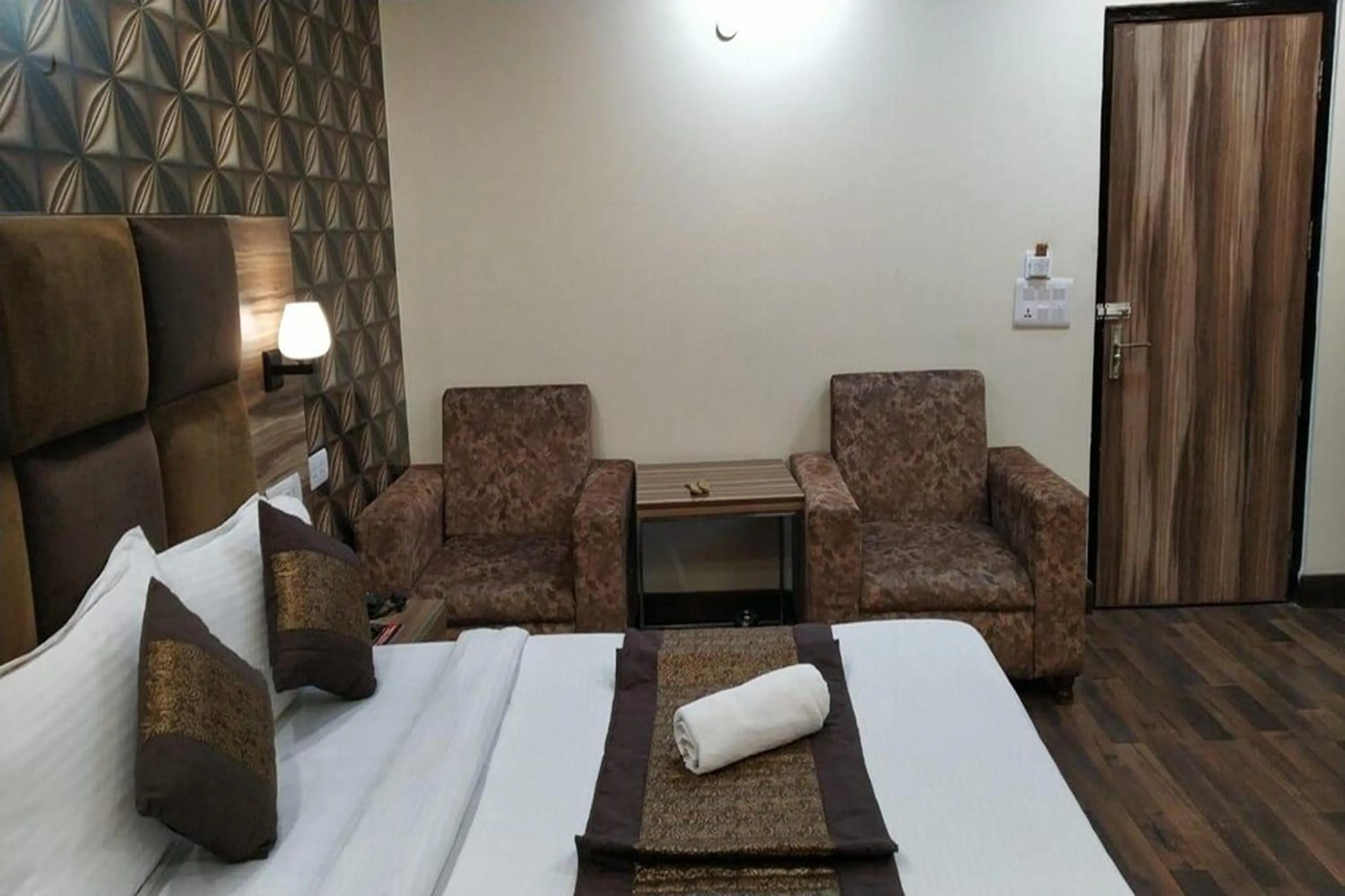 Bed in HOTEL SINGH CONTINETAL