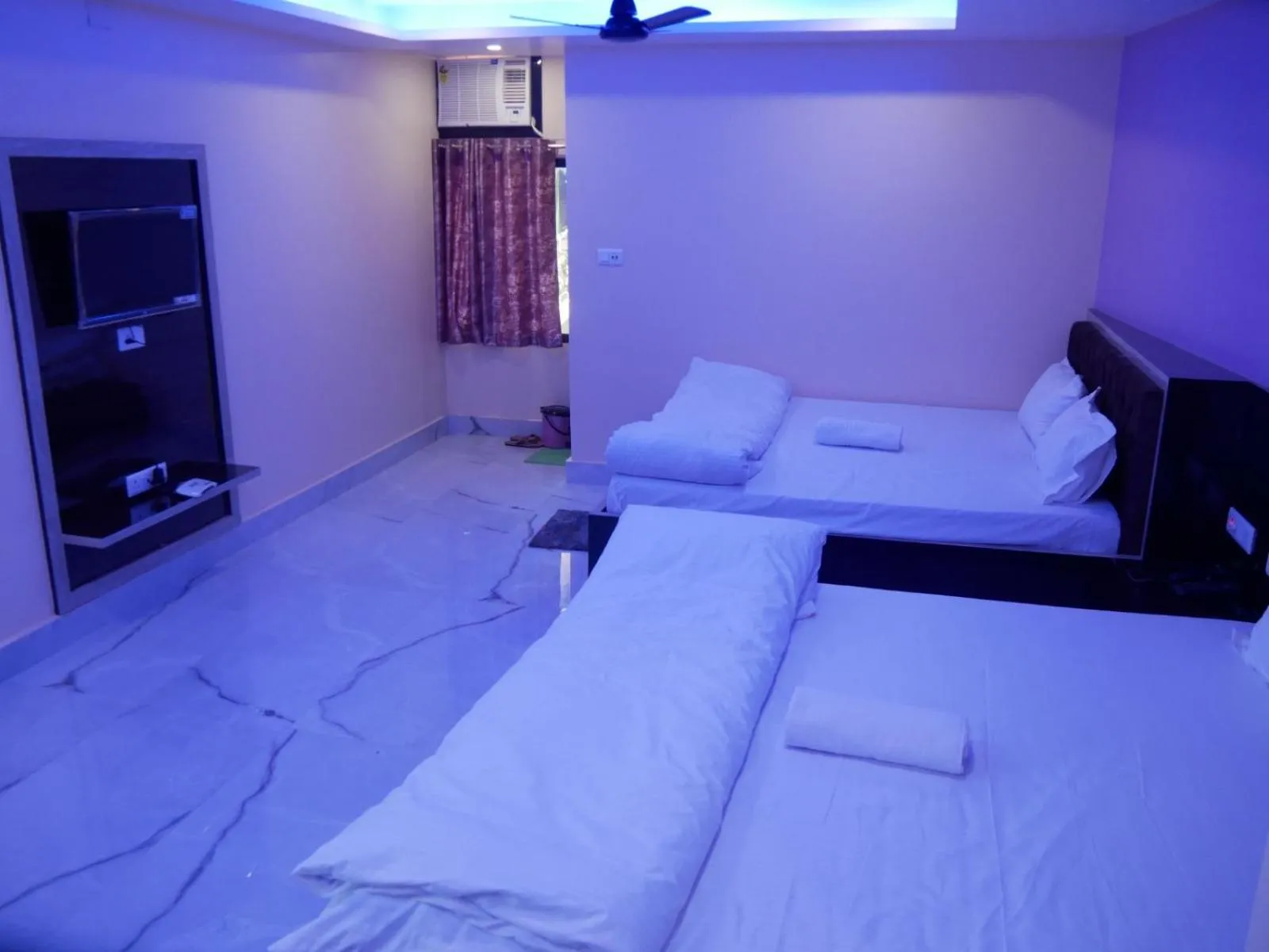 Bed in Vaidehi Inn-A Unit of vaidehi guest house