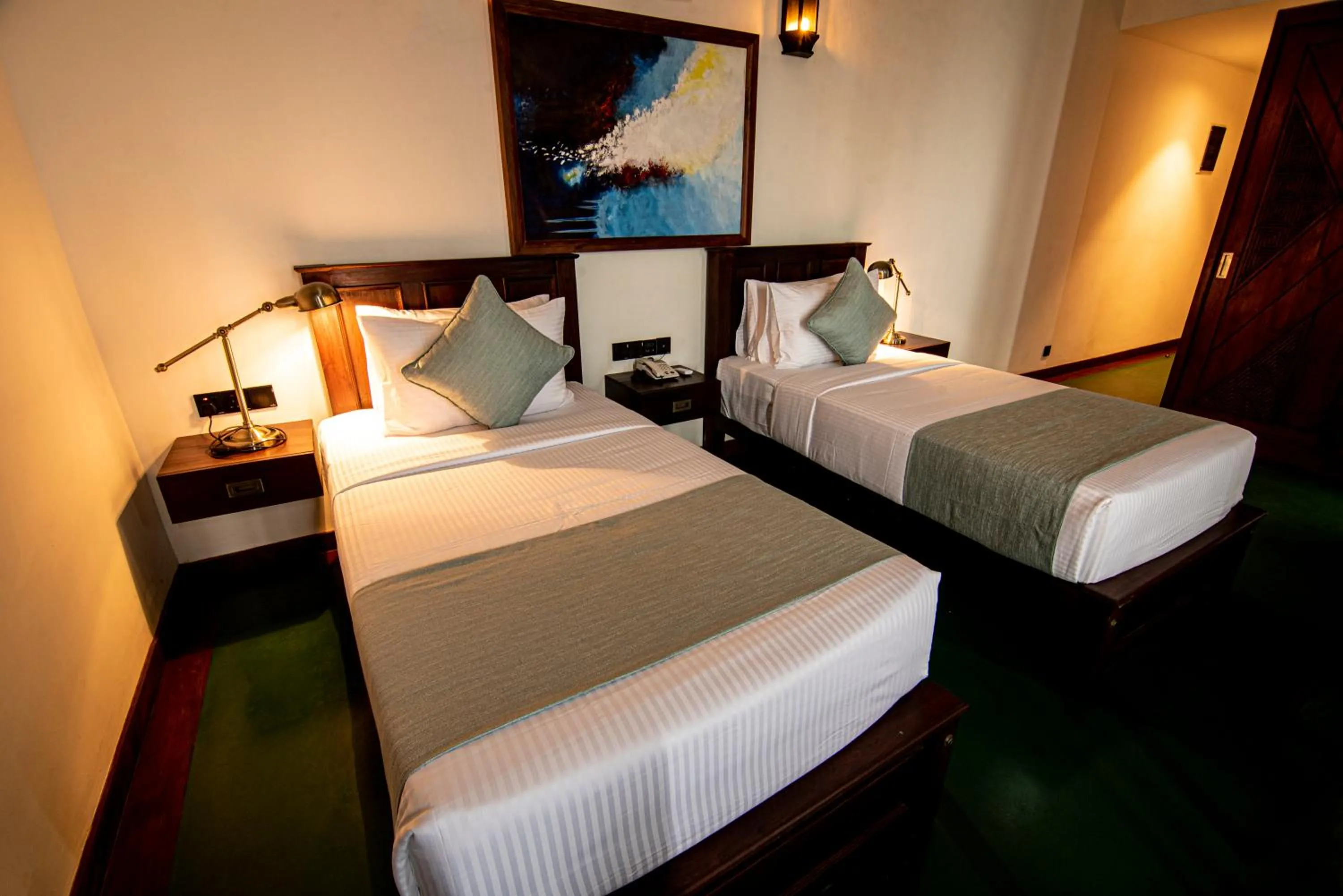 Bed in The Rockwall Boutique Hotel Bentota